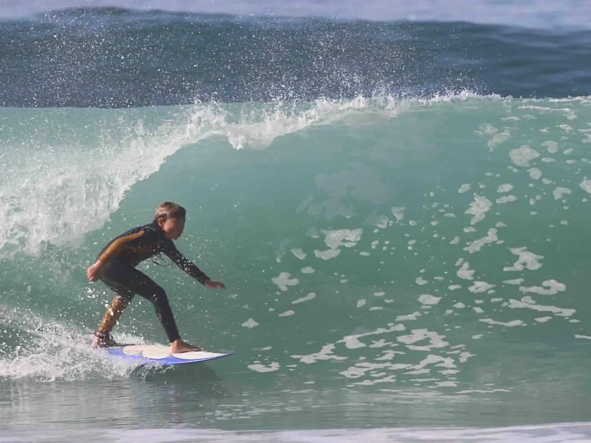a man surfing on the waves