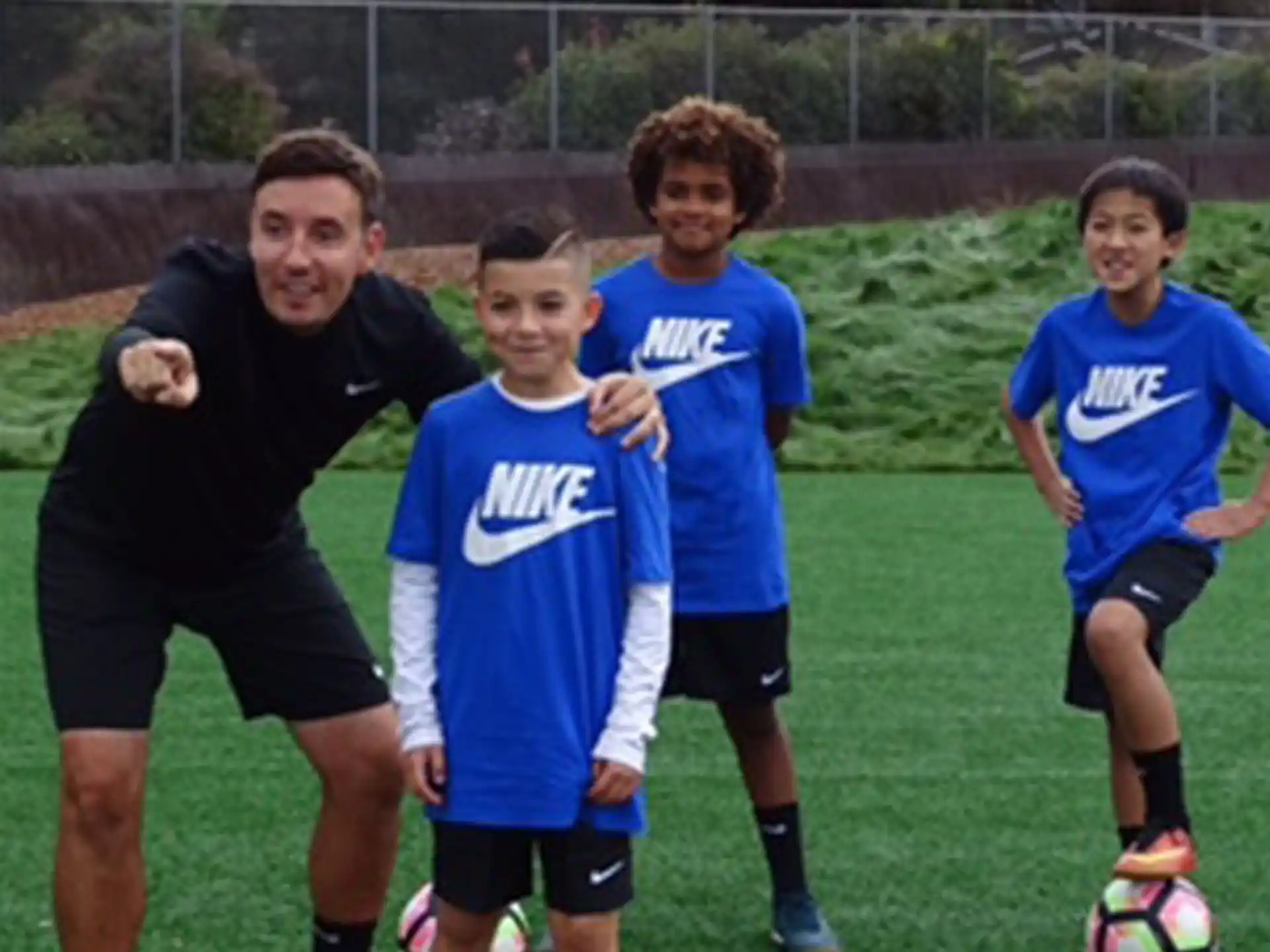 a group of boys playing football