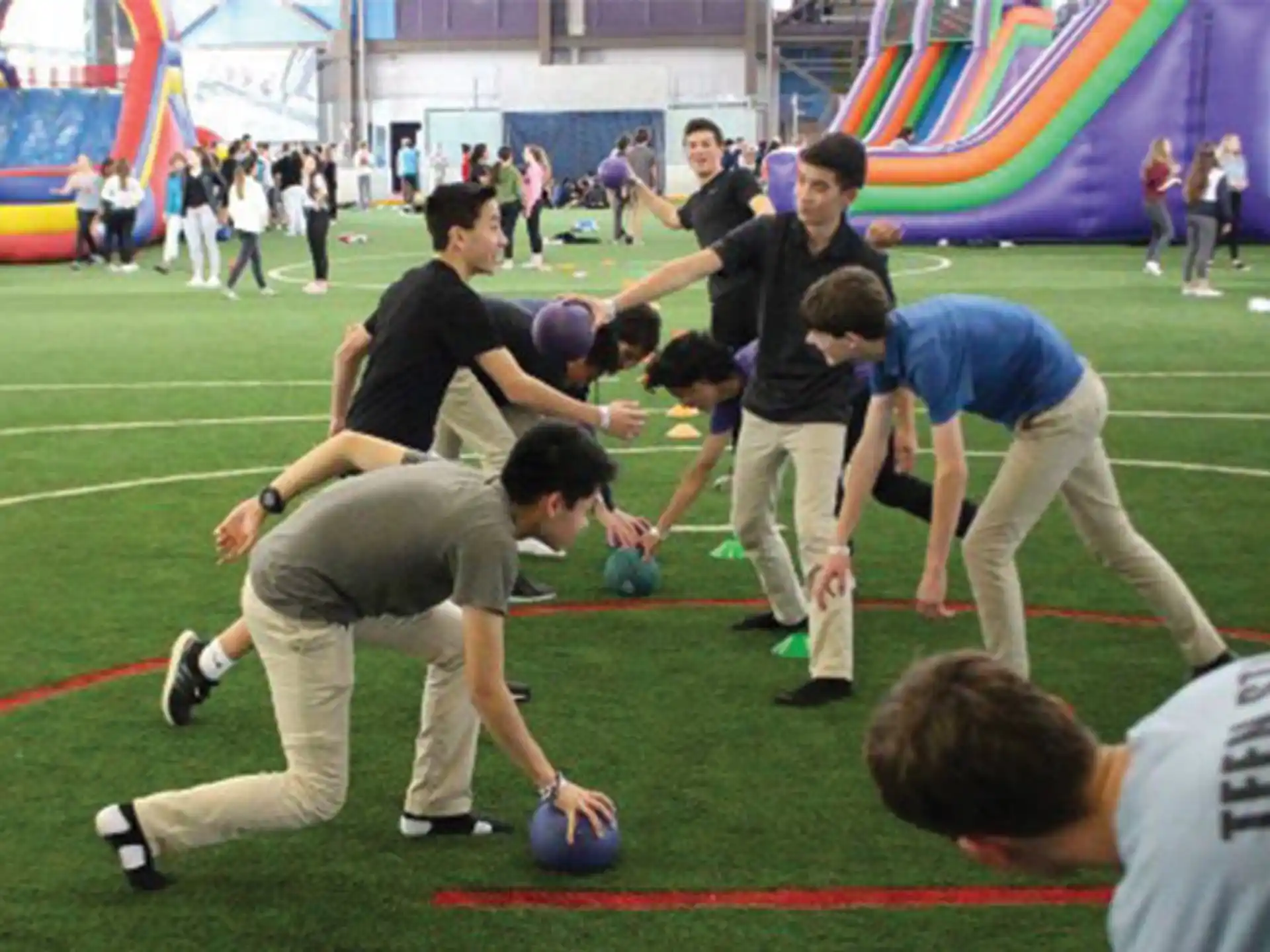 a group of people playing football
