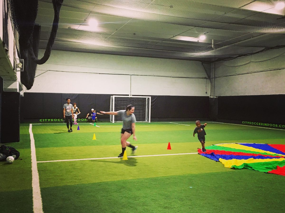 a group of people playing football