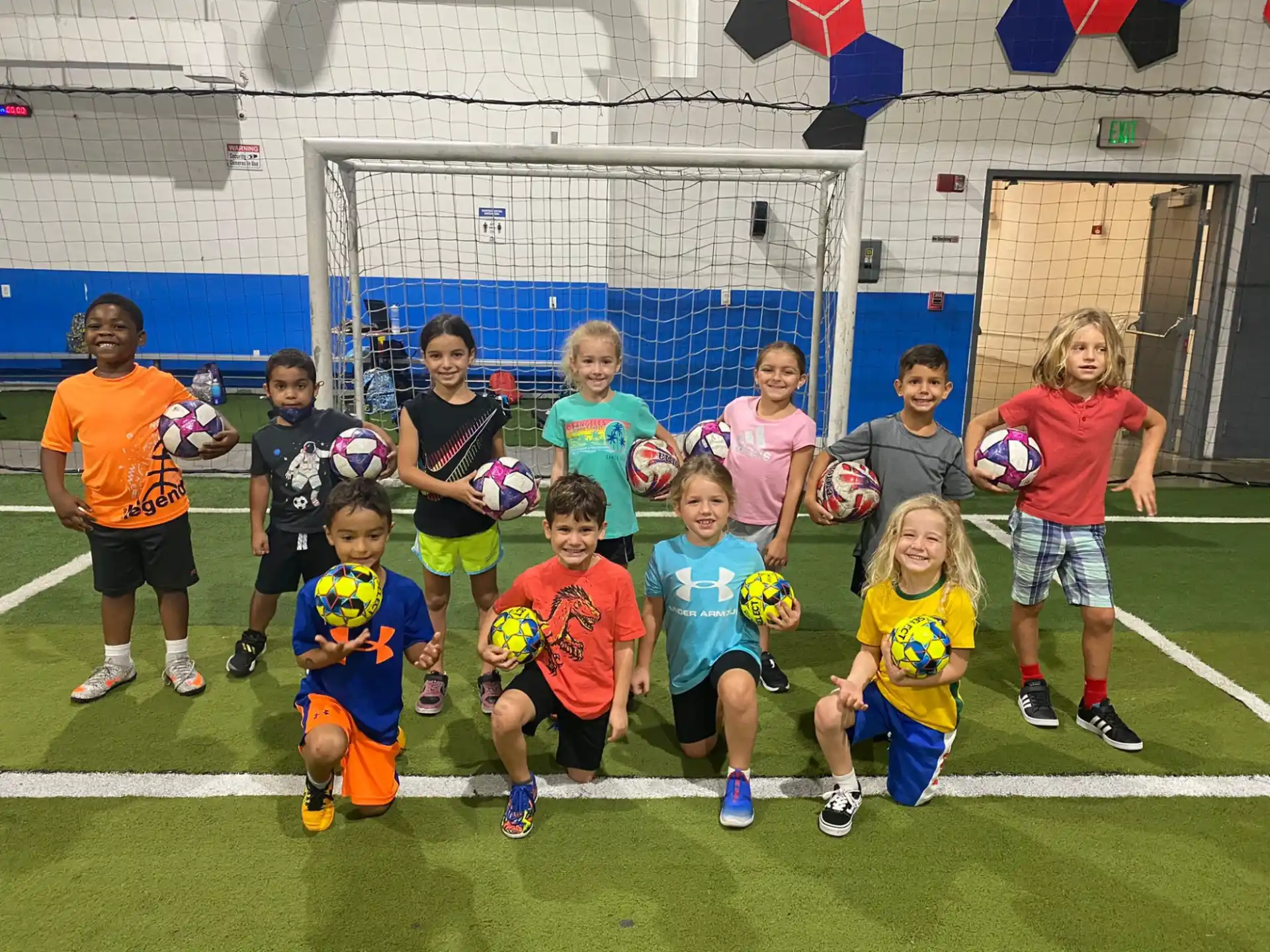 a group of kids posing for a photo