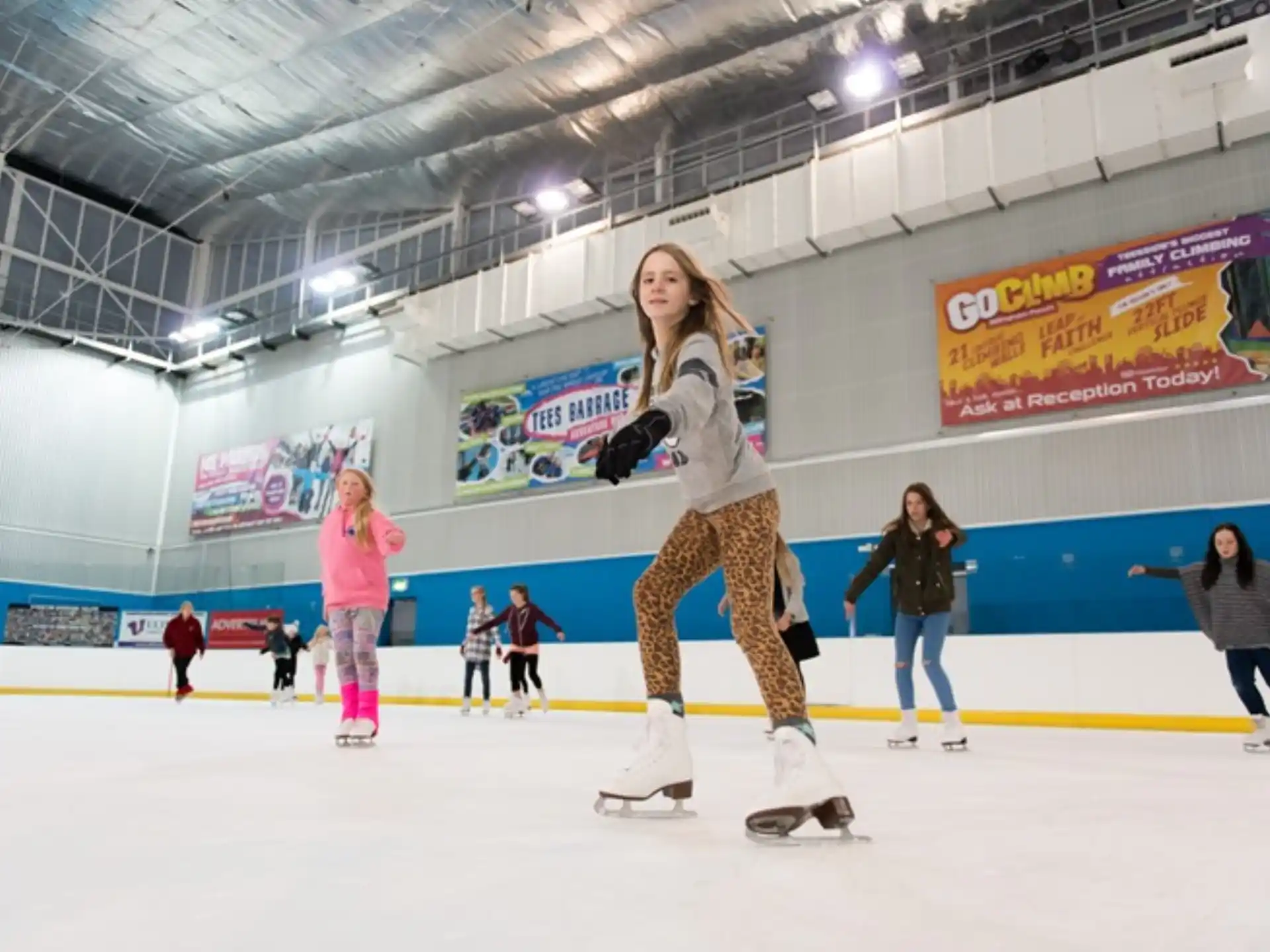 a group of people ice skating