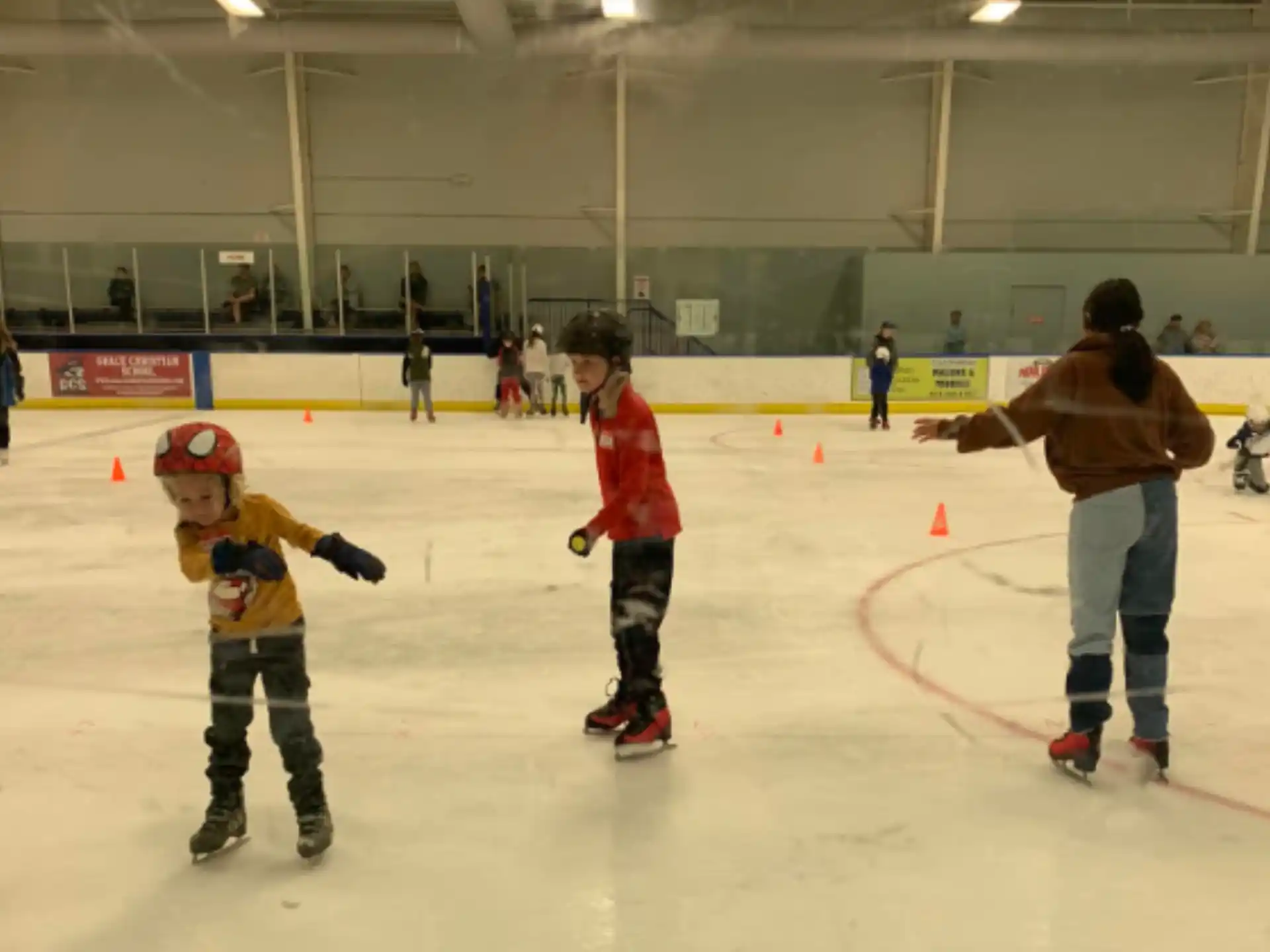 a group of people ice skating