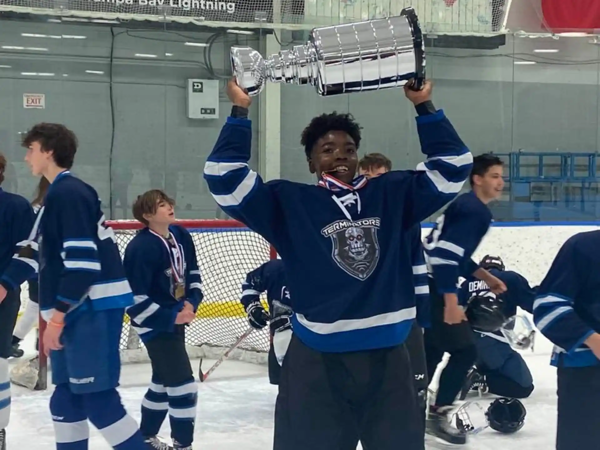 a person holding a trophy