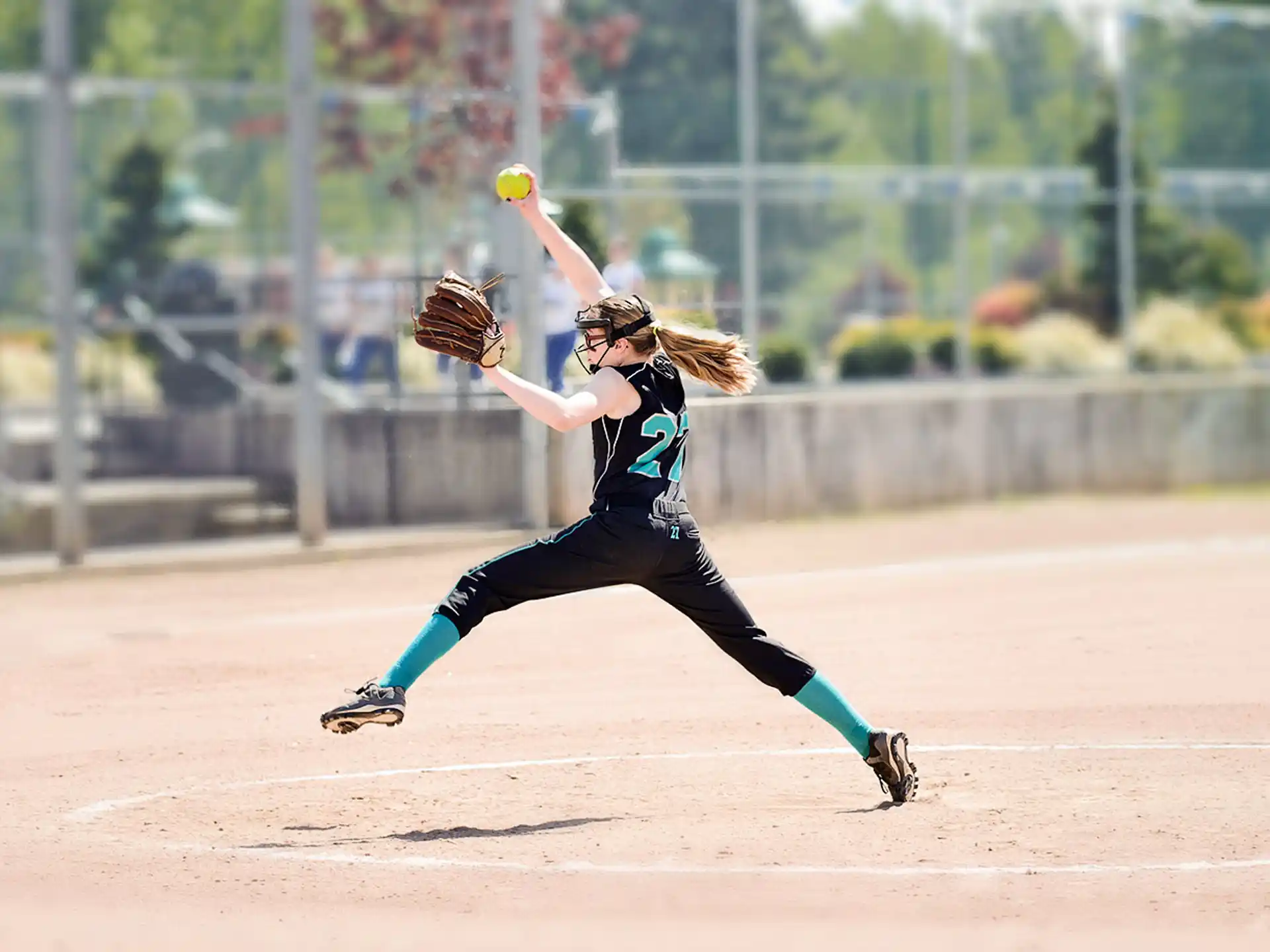 a person catching a baseball