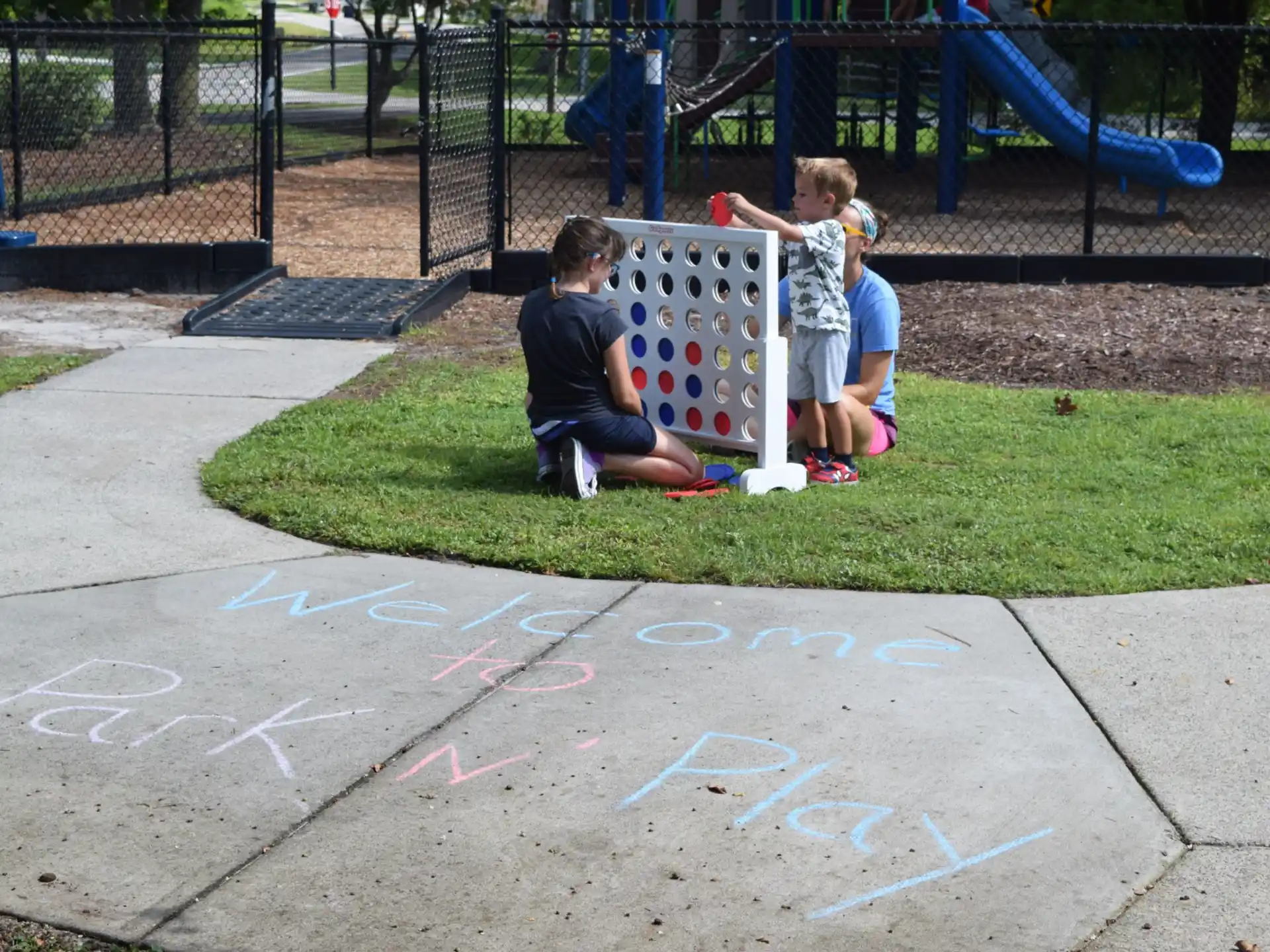 a group of kids playing on a bench