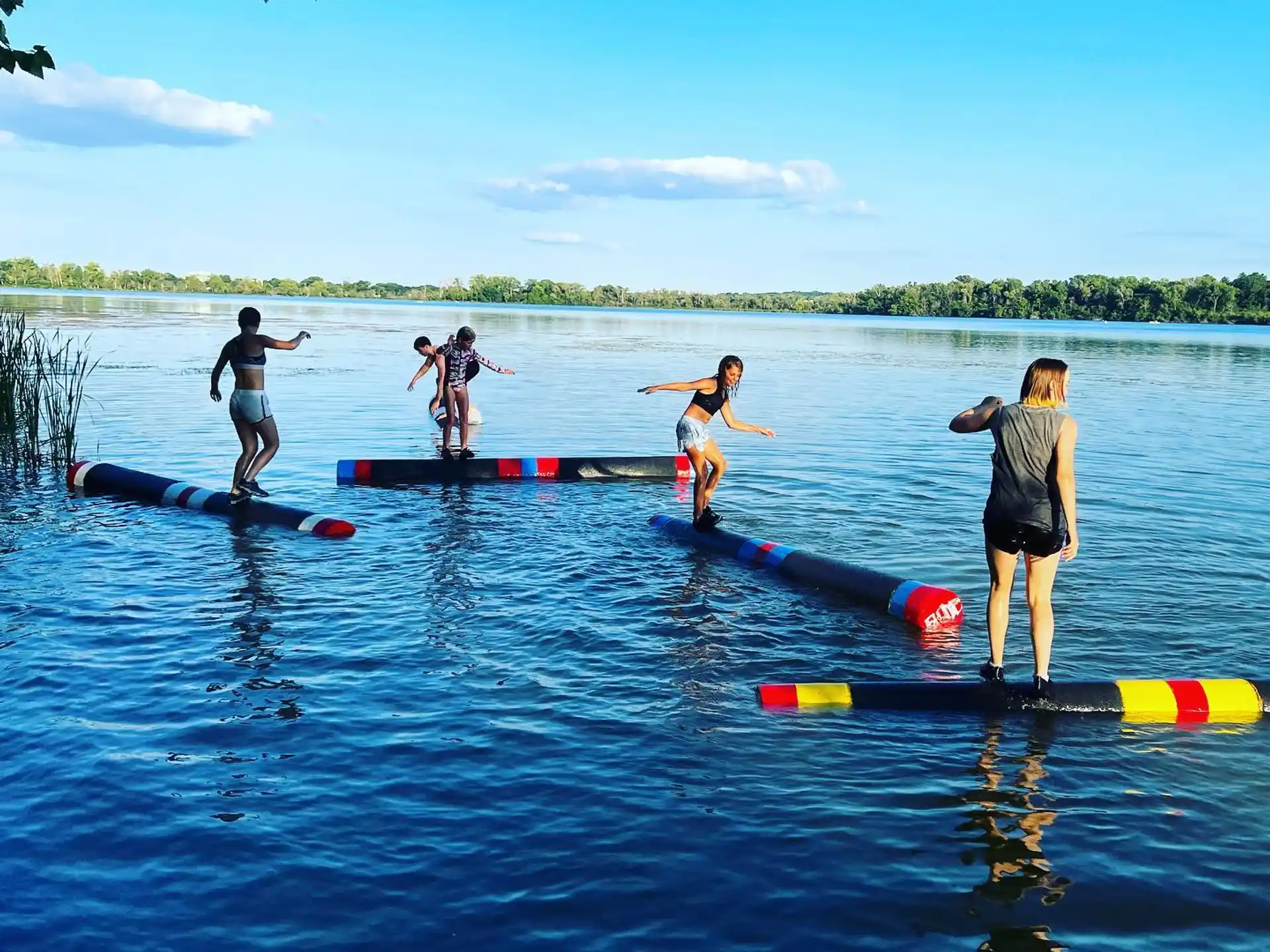 a group of people on a lake
