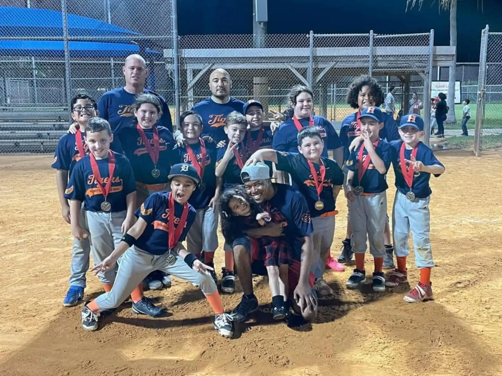 a group of kids posing for a photo