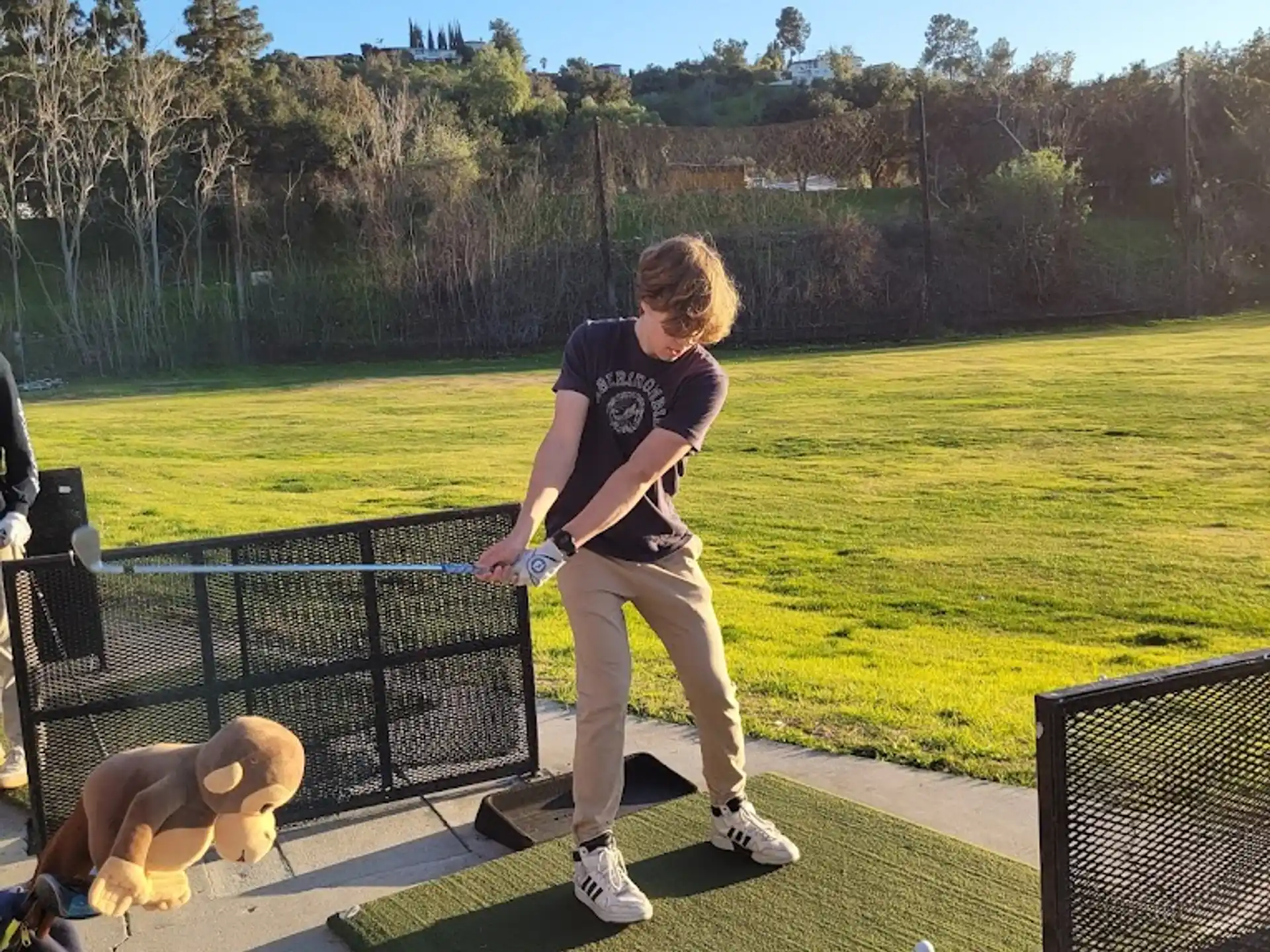 a person and a dog on a deck