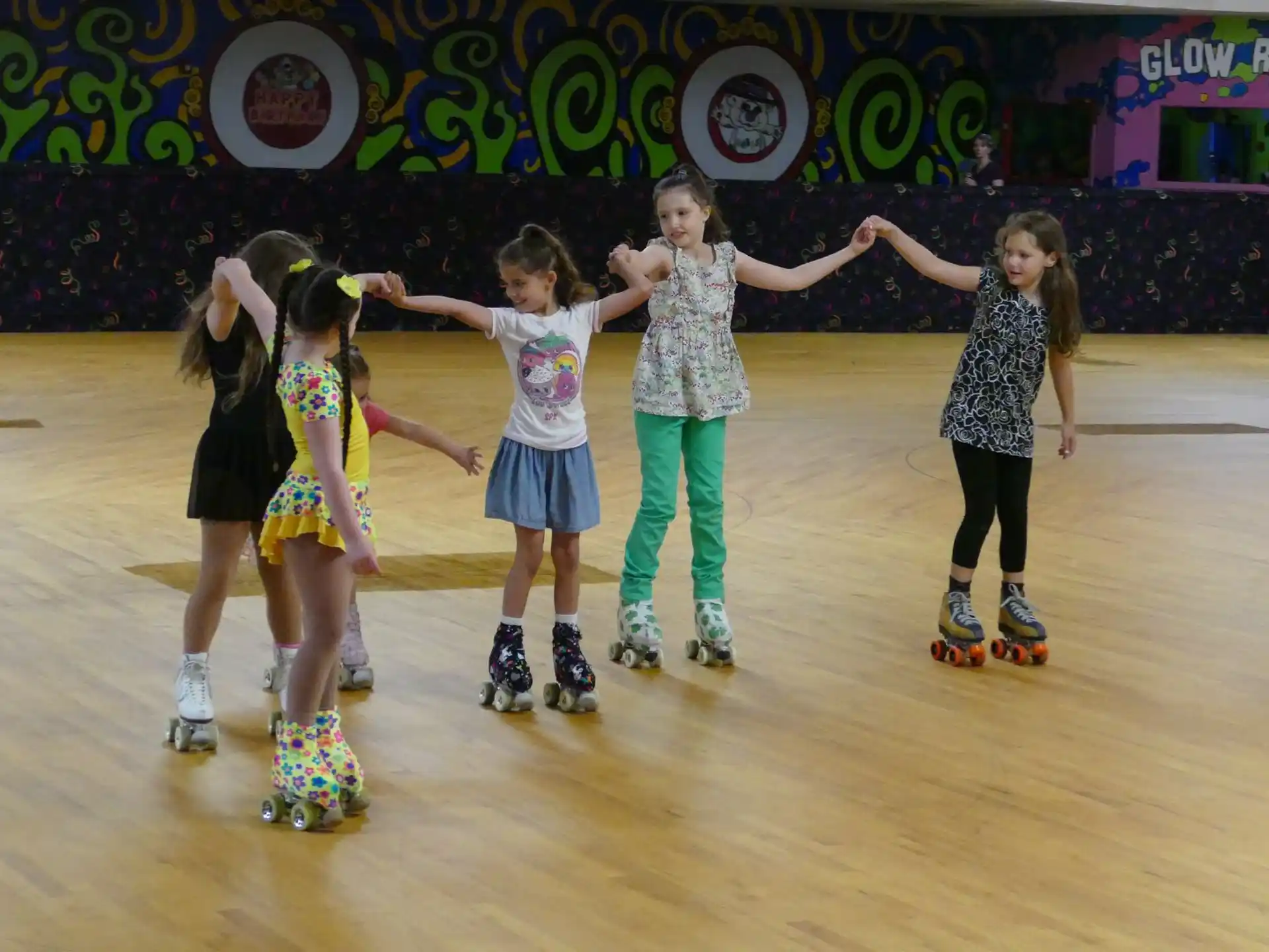 a group of girls on an ice rink