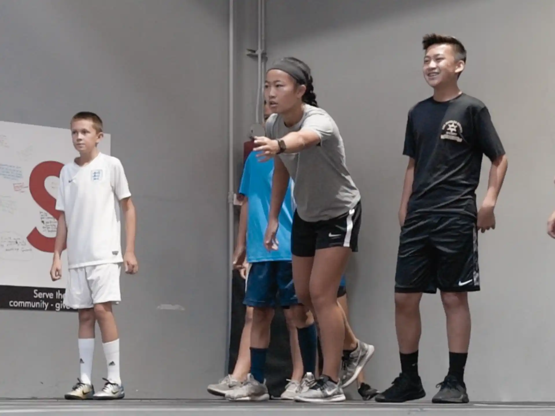 a group of people standing in a room