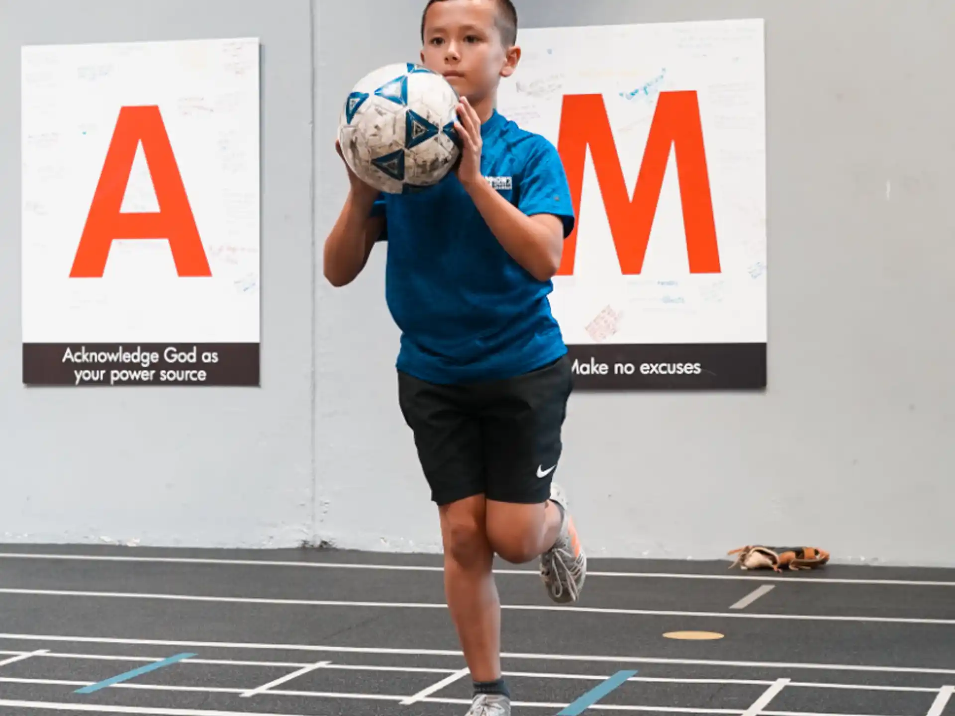 a person holding a ball