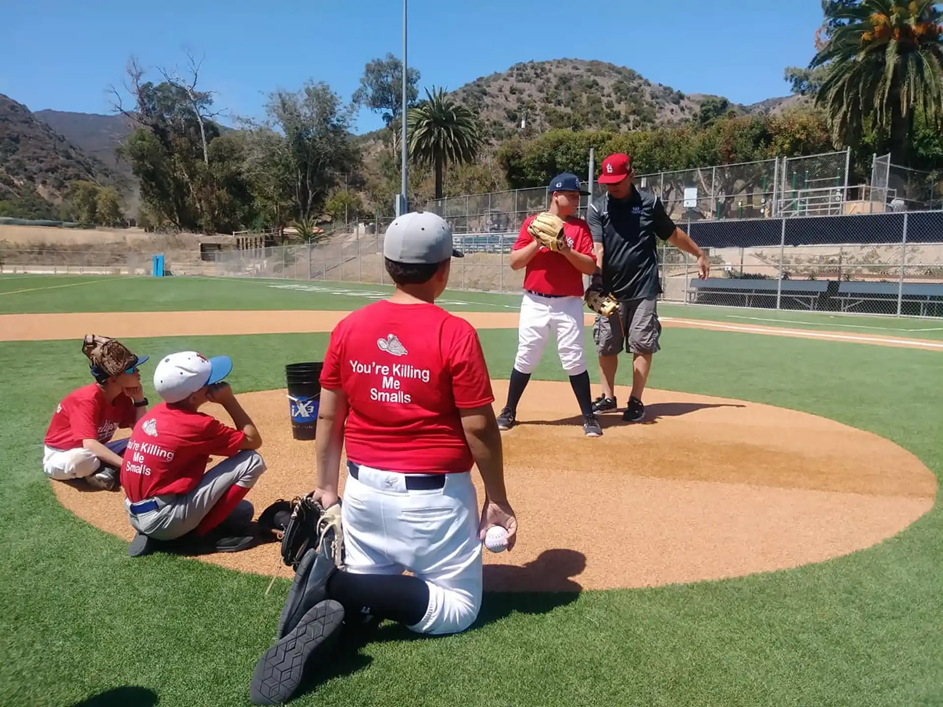 a baseball player prepares to swing a bat