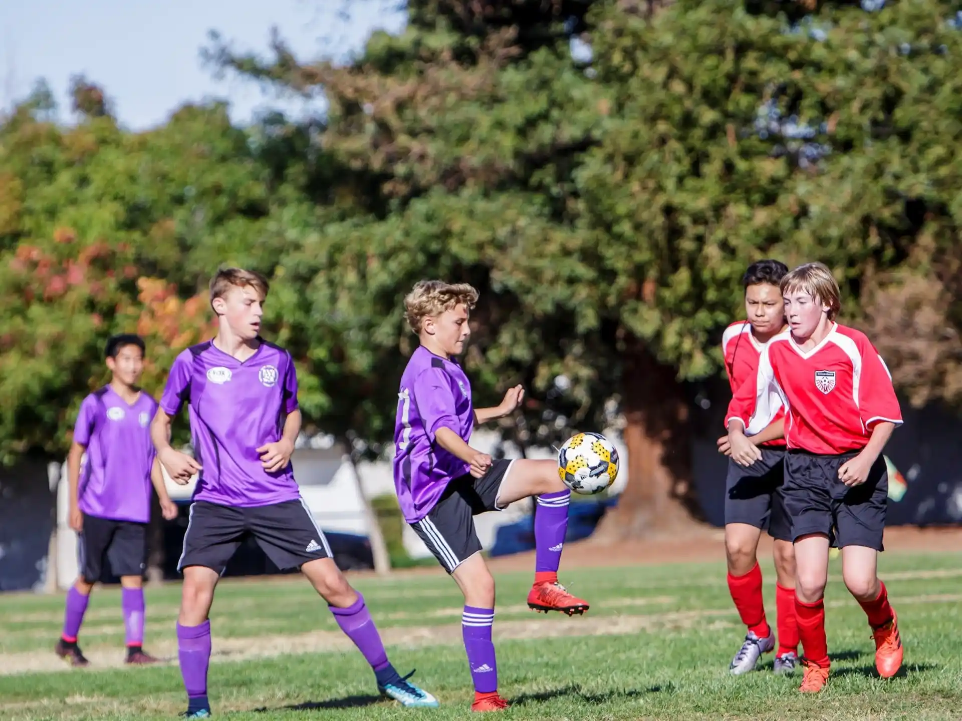 a group of young men playing football