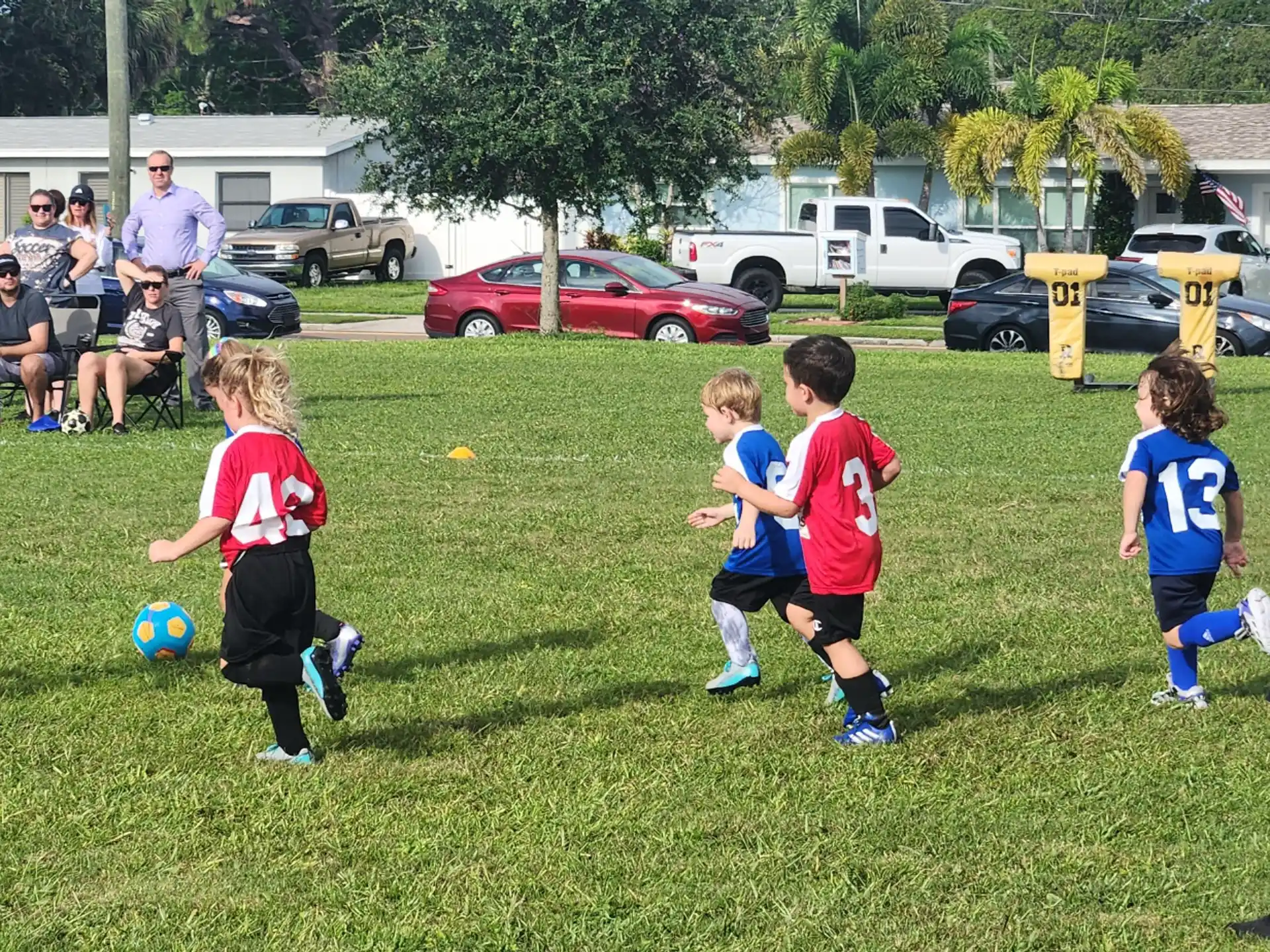 a group of kids playing football