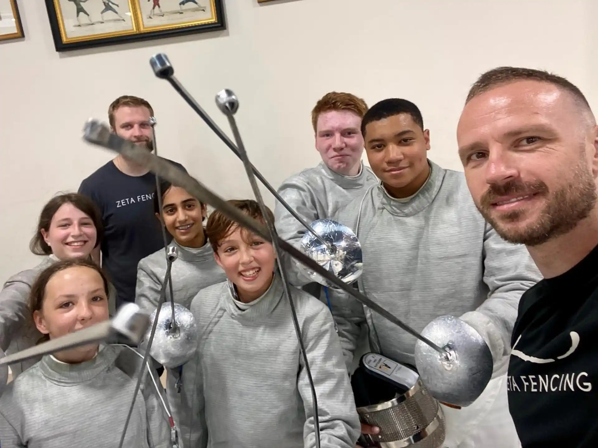 a group of people holding microphones