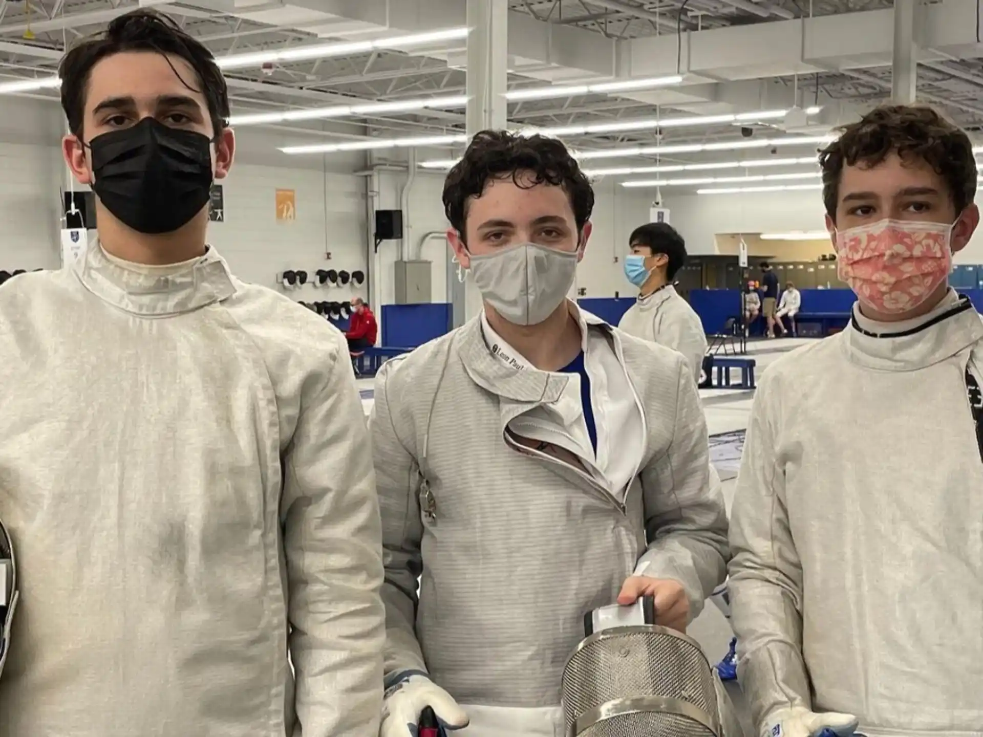 a group of people wearing face masks