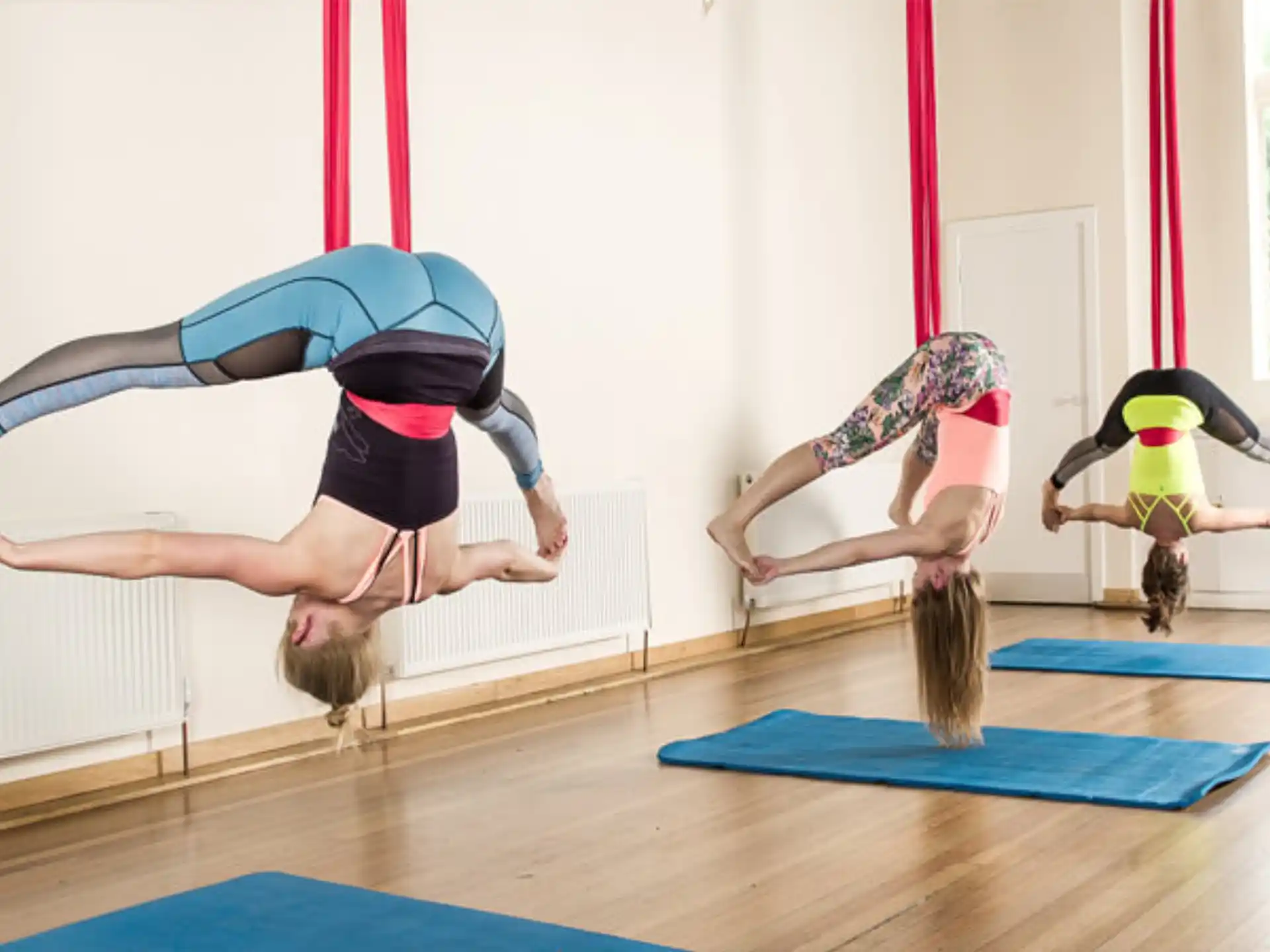 a group of women doing yoga