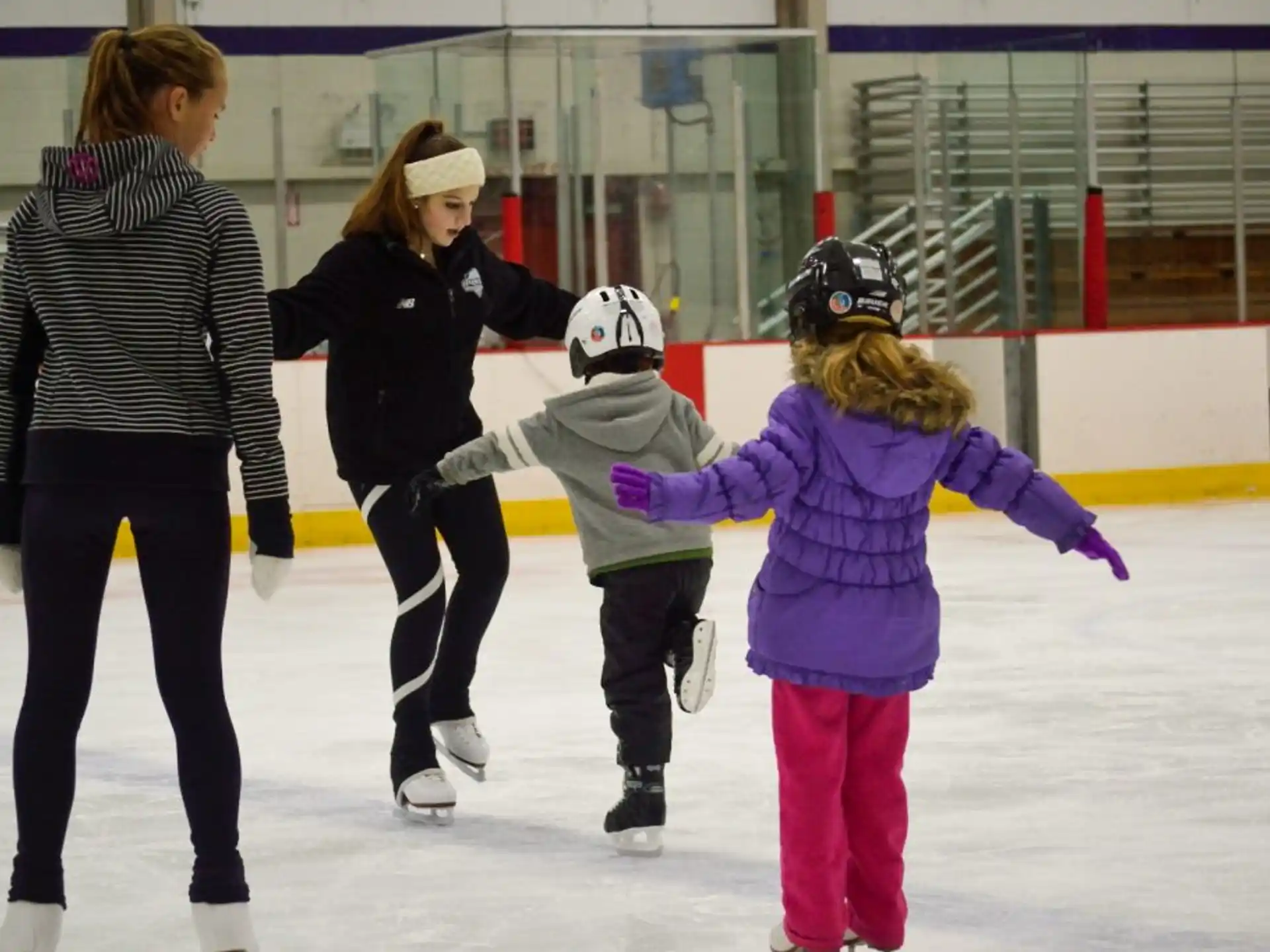 a group of people ice skating