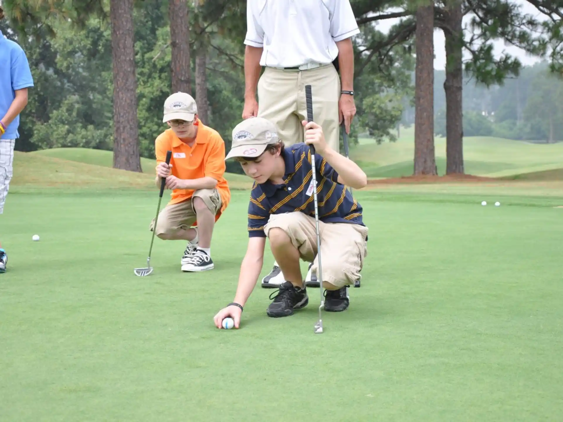 a group of people playing golf