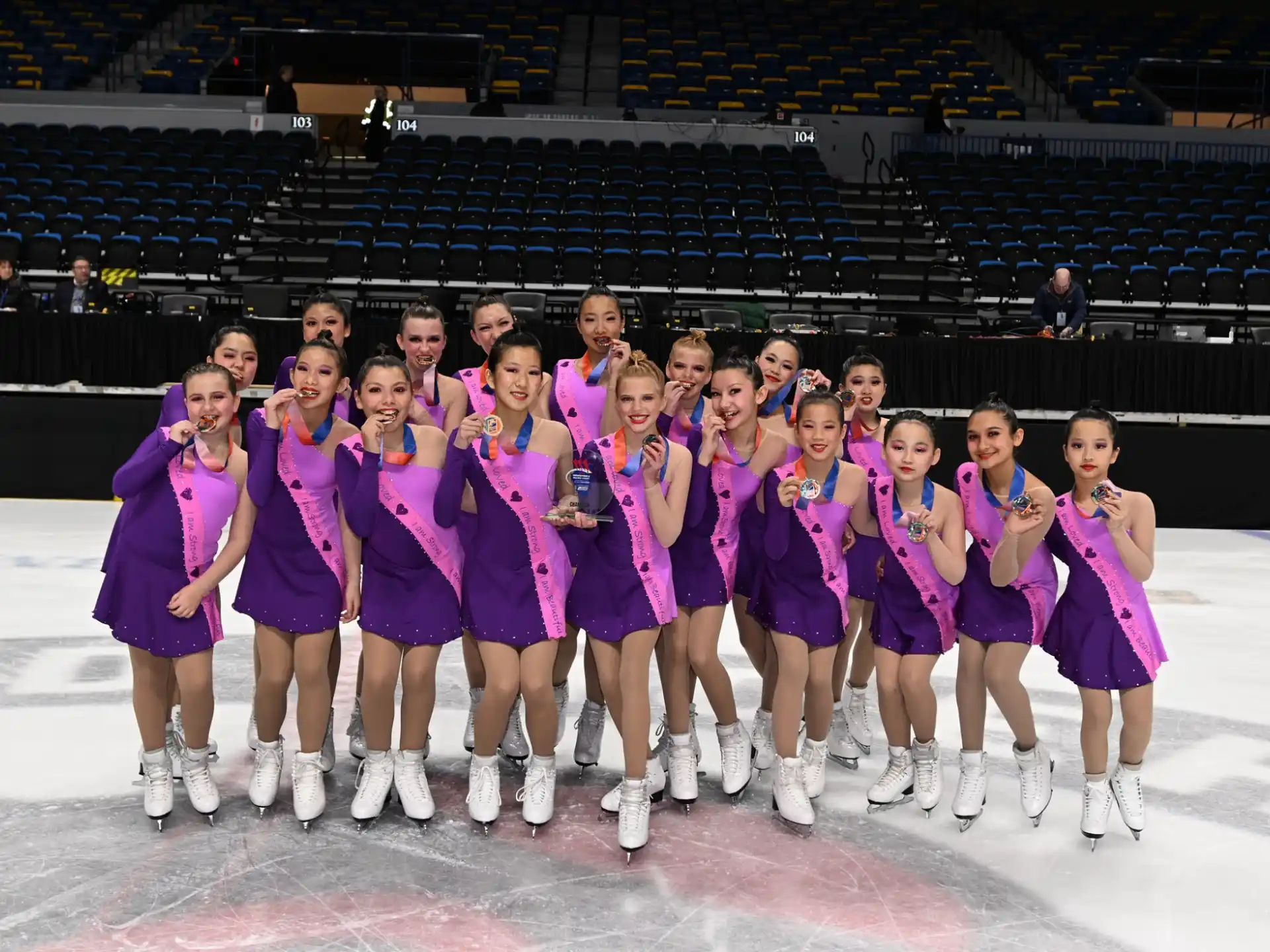 a group of women in purple uniforms