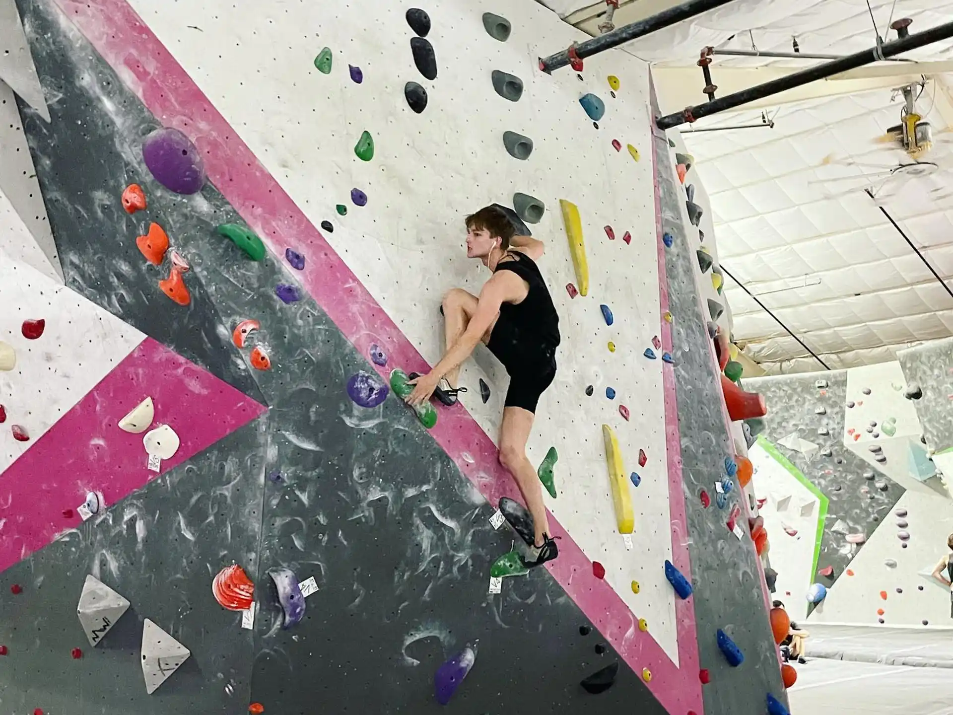 a person climbing a rock wall