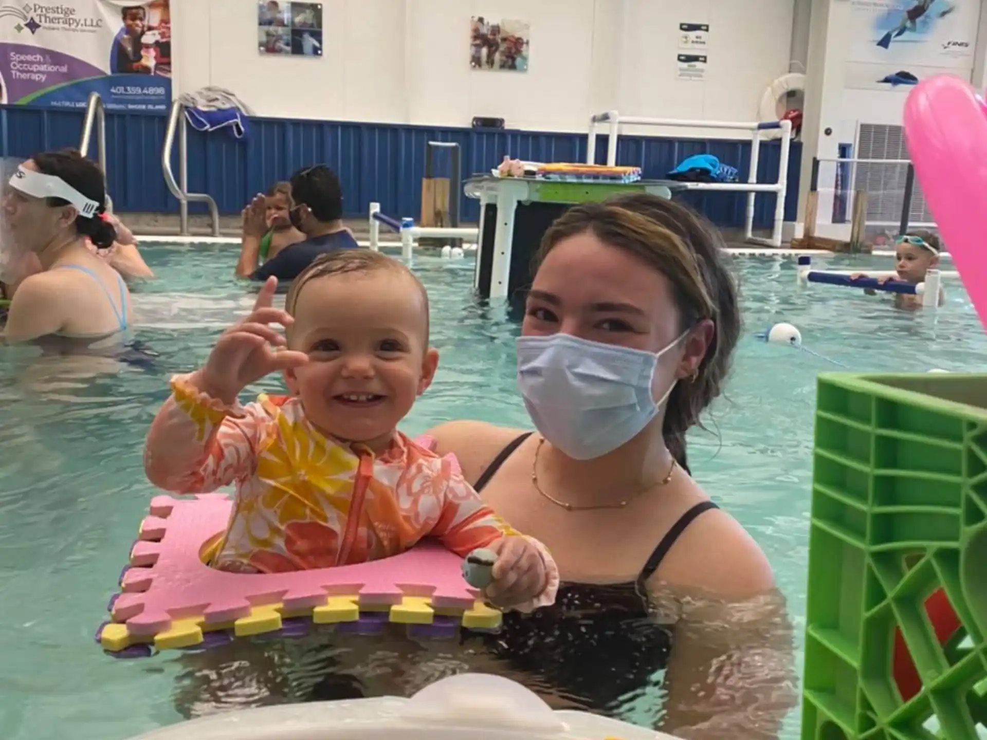 a group of children in a pool