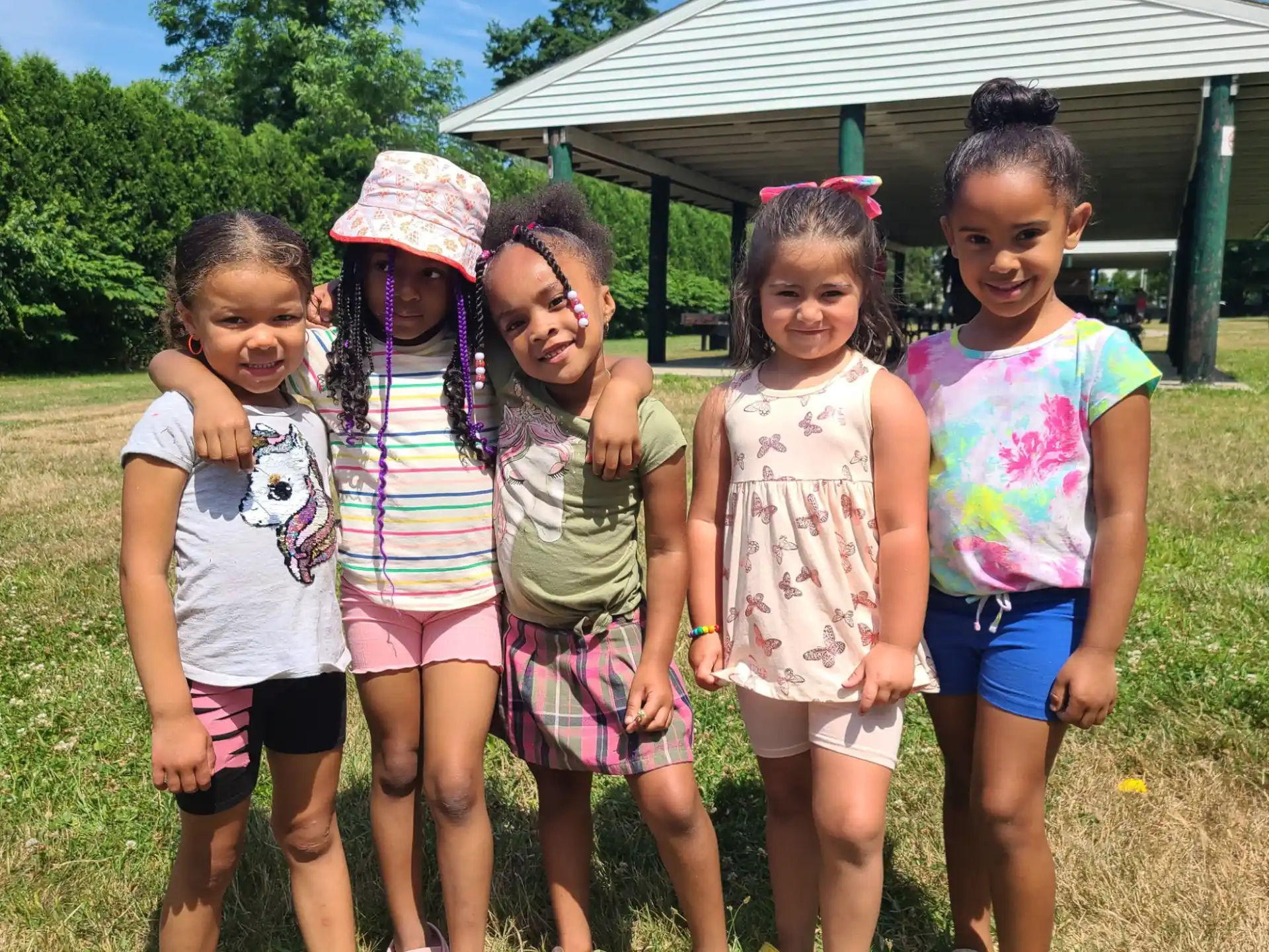 a group of children posing for a photo