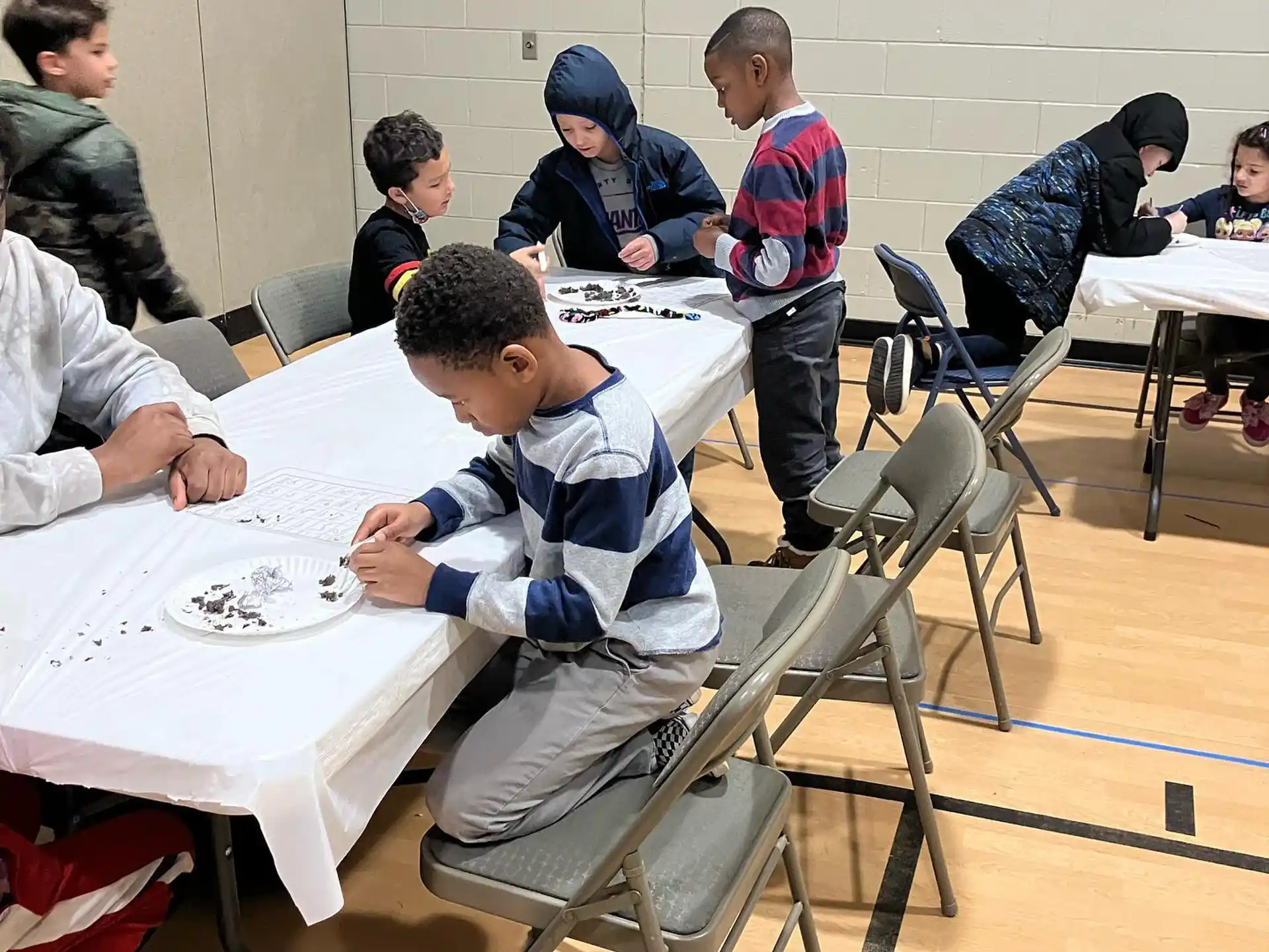 a group of people sitting at tables