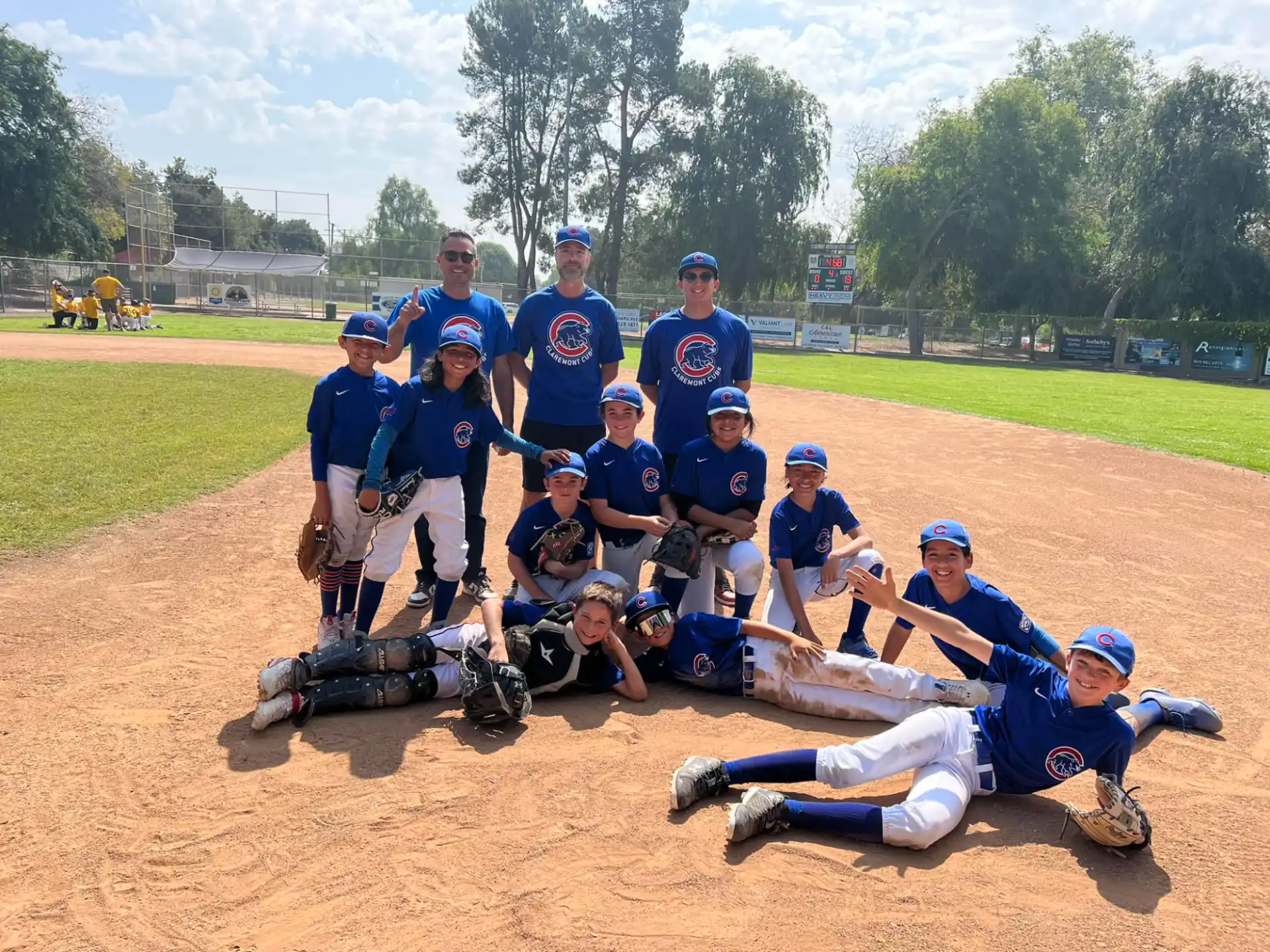 a group of baseball players posing for a photo