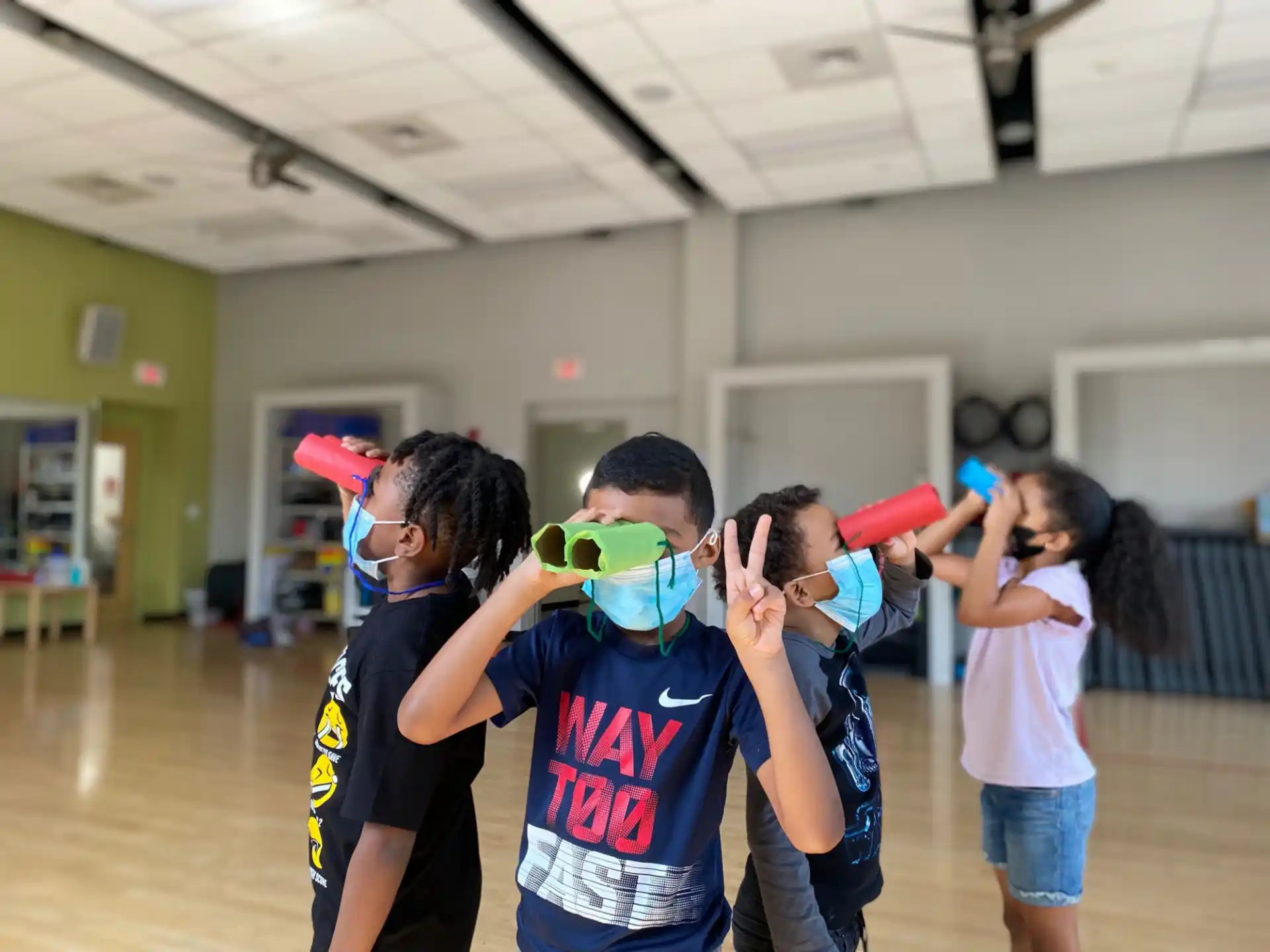 a group of kids with a toy