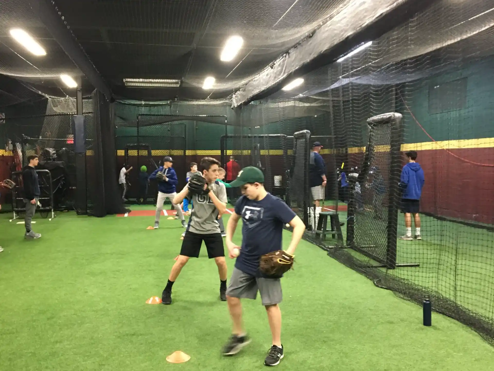 a group of people playing baseball