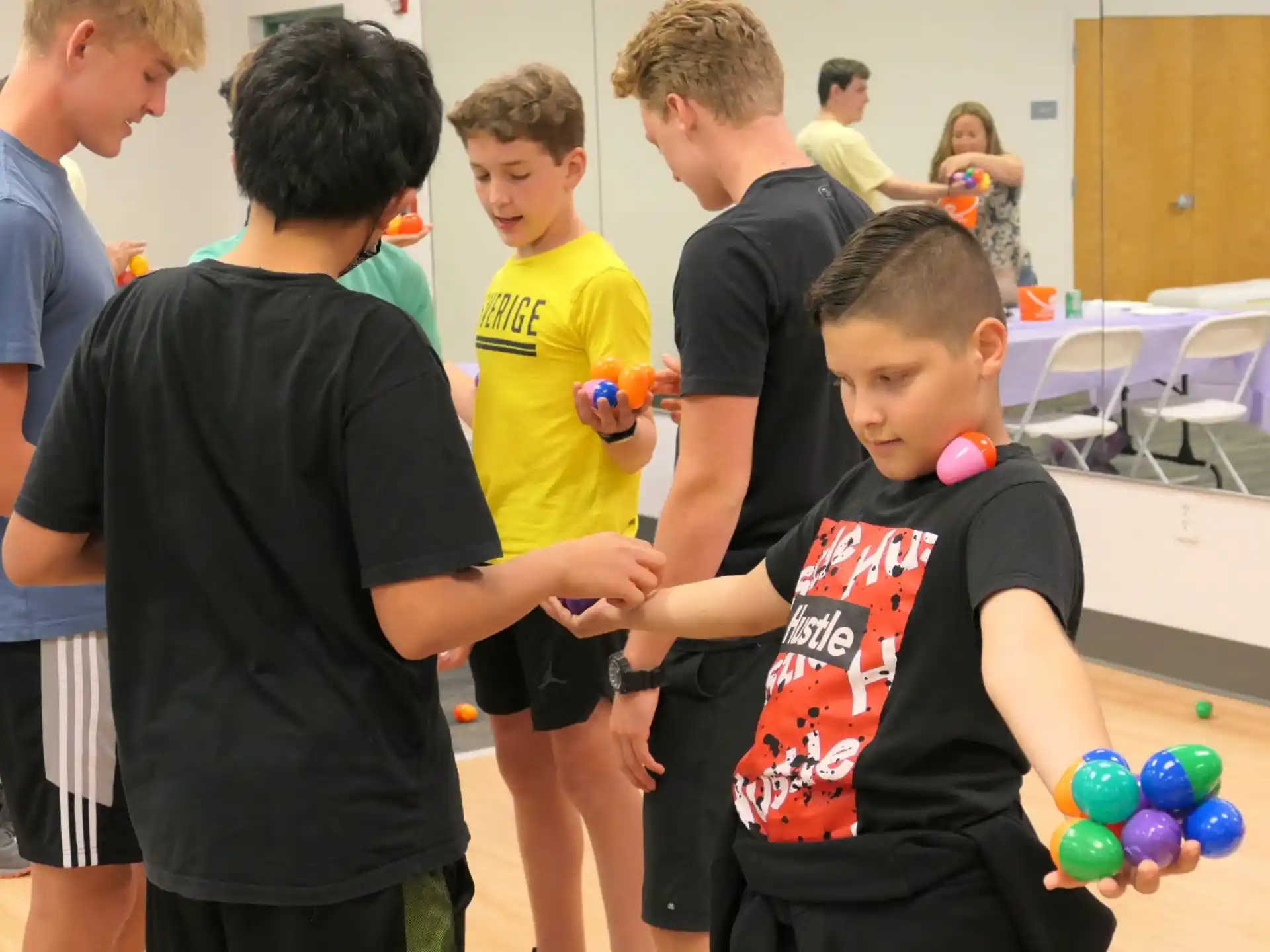 a group of boys playing with balls
