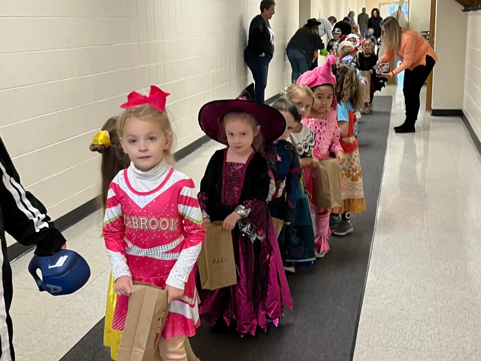 a group of children in clothing