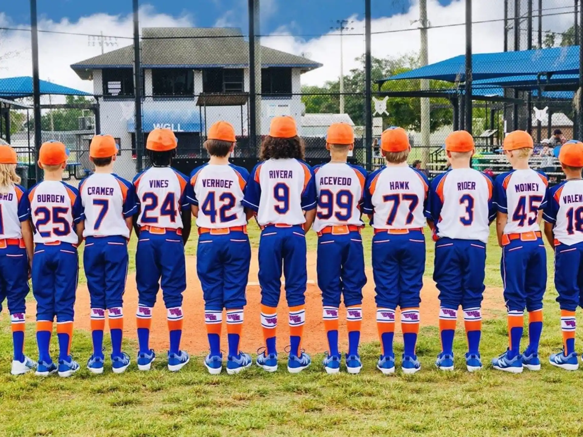 a group of people in sports uniforms