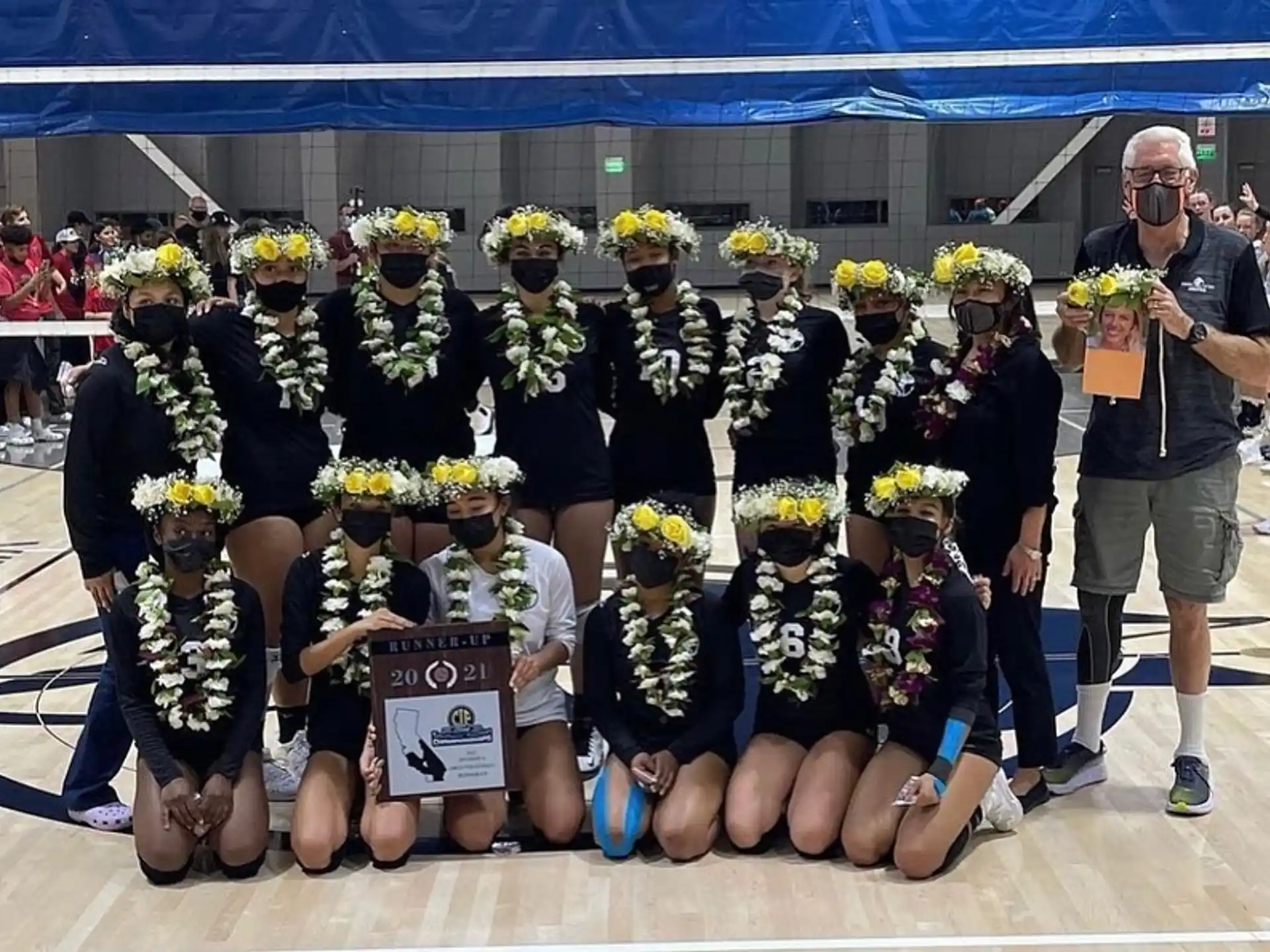 a group of people holding flowers