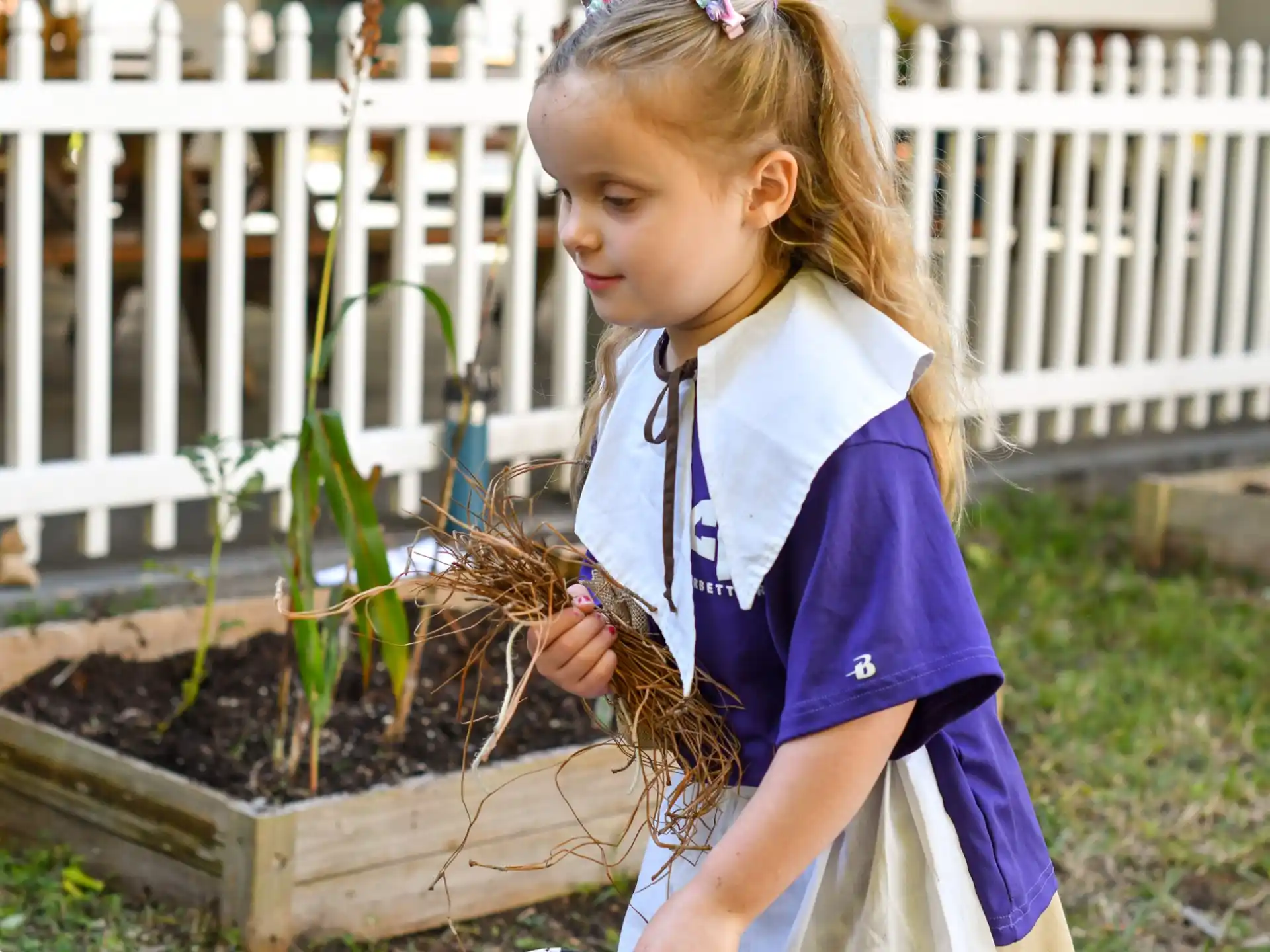 a girl holding a snake