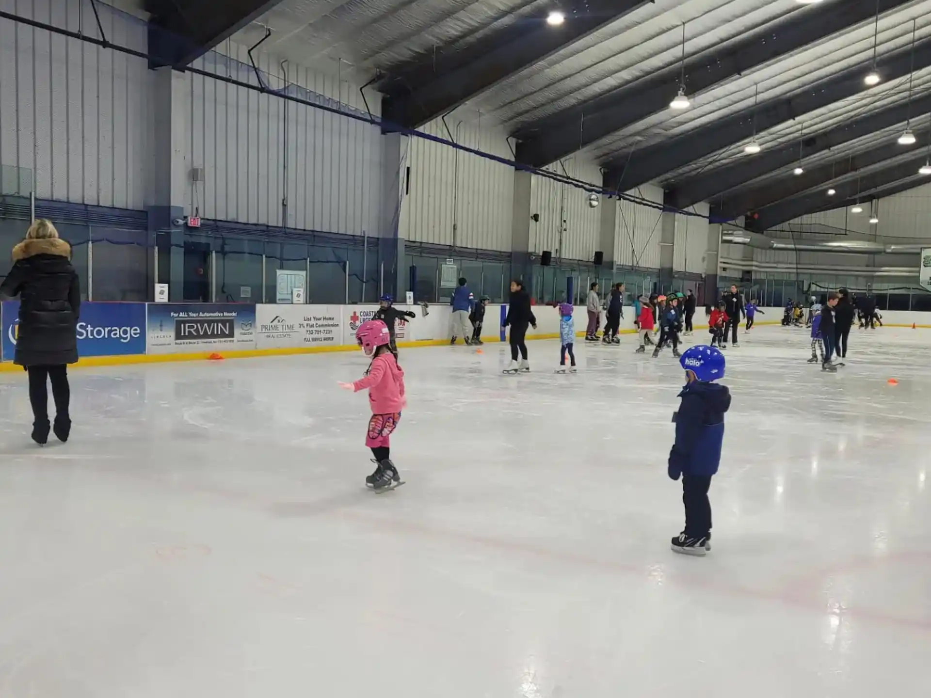 a group of people on an ice rink