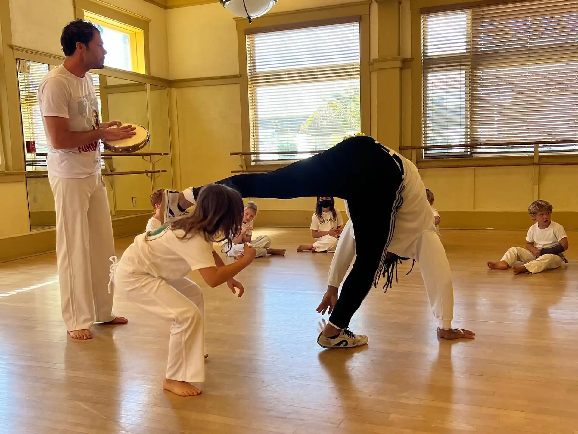 a man and a woman doing yoga