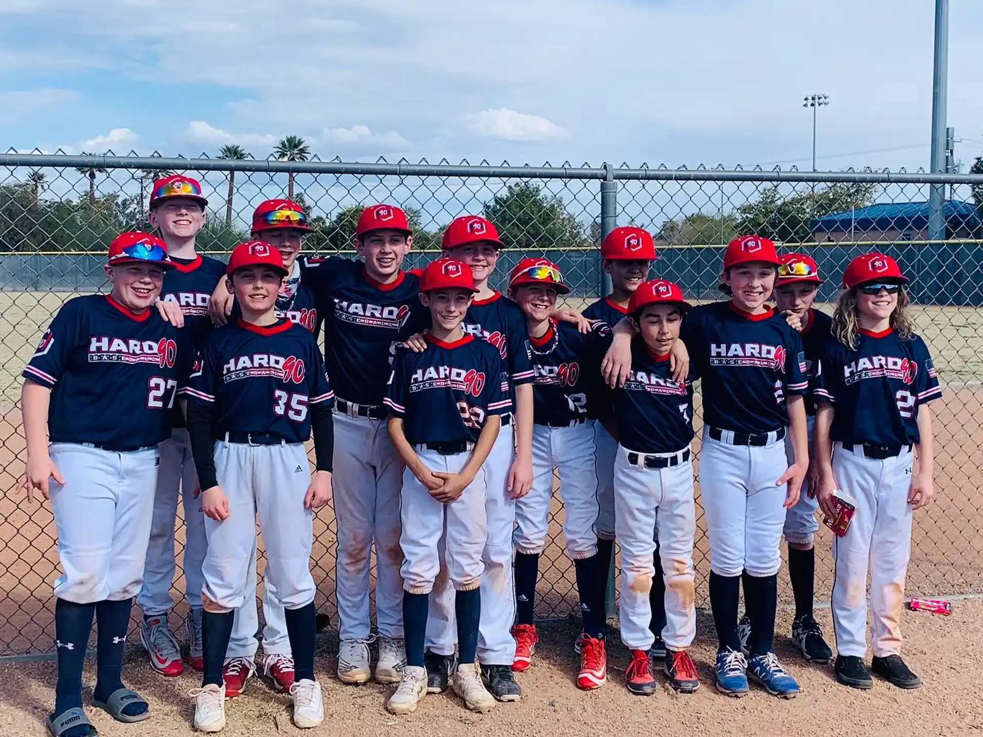 a group of people wearing baseball uniforms