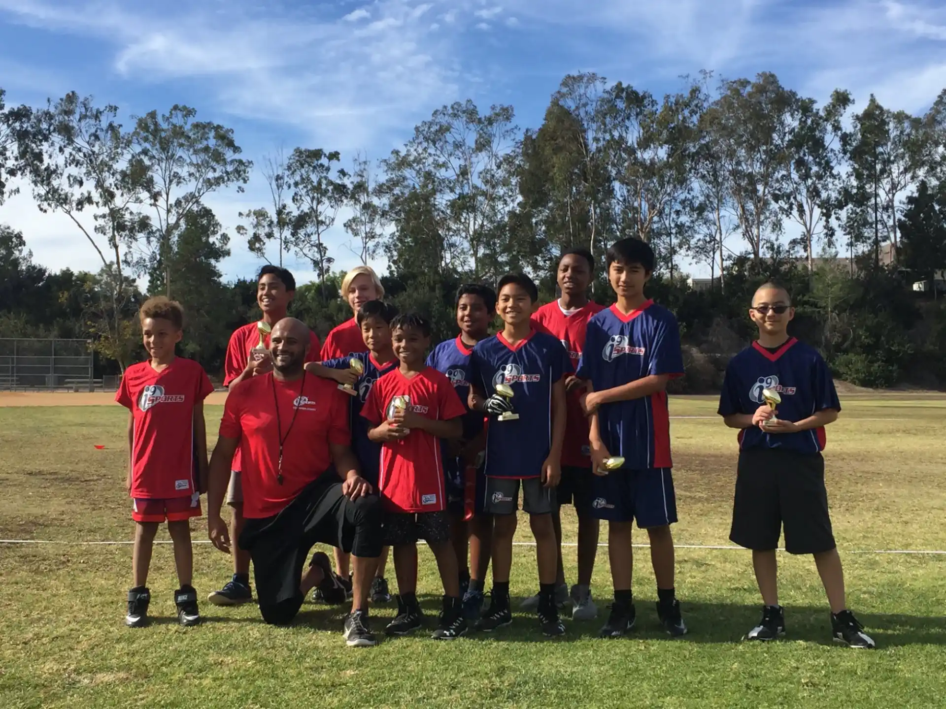 a group of boys in sports uniforms