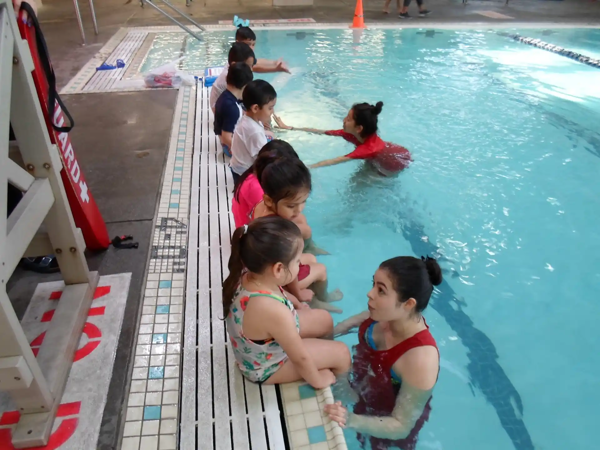 a group of people in a pool