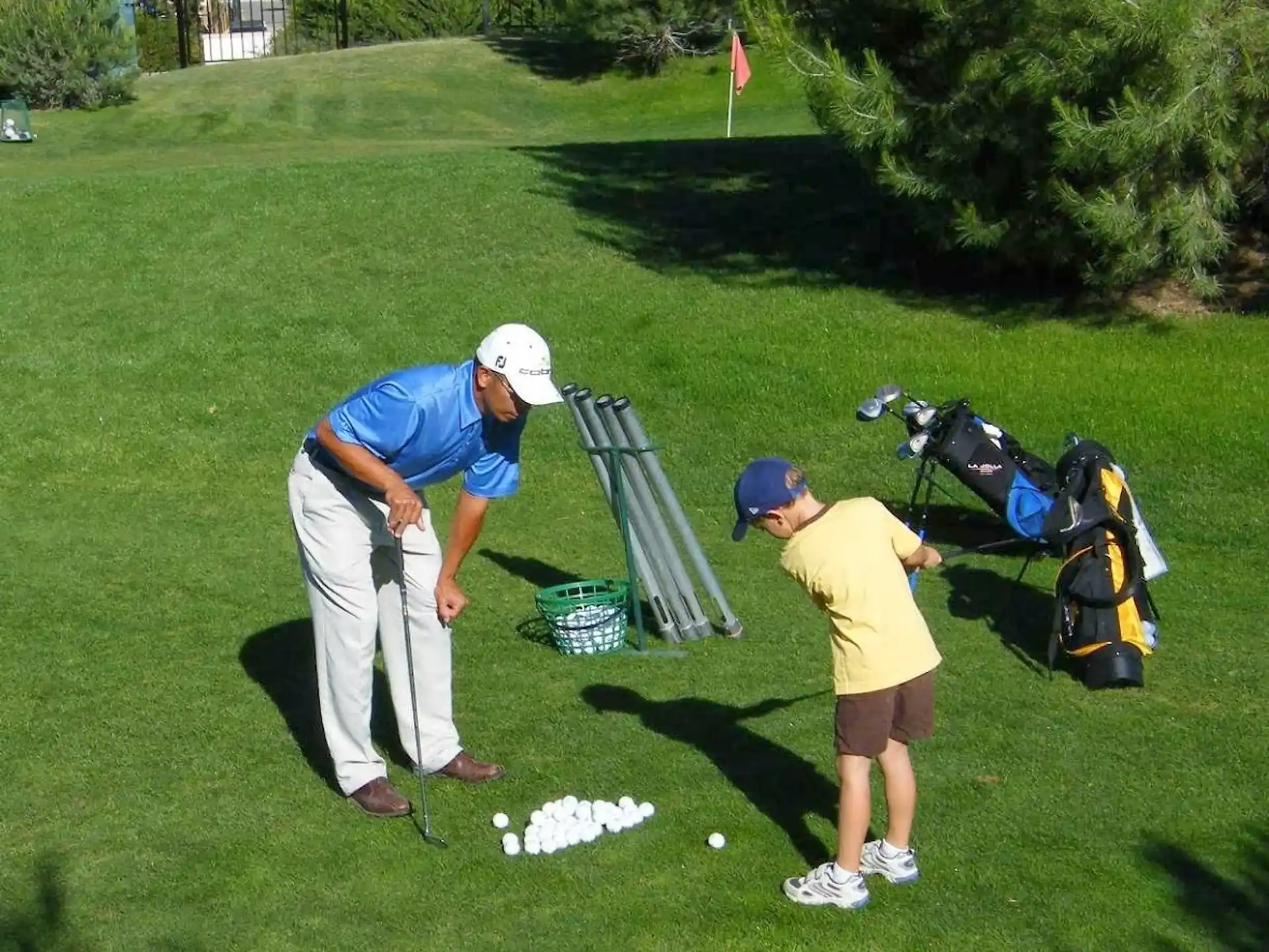 a couple of men playing golf