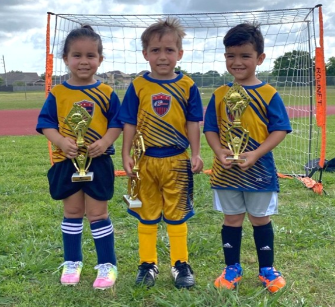 a group of boys in football uniforms
