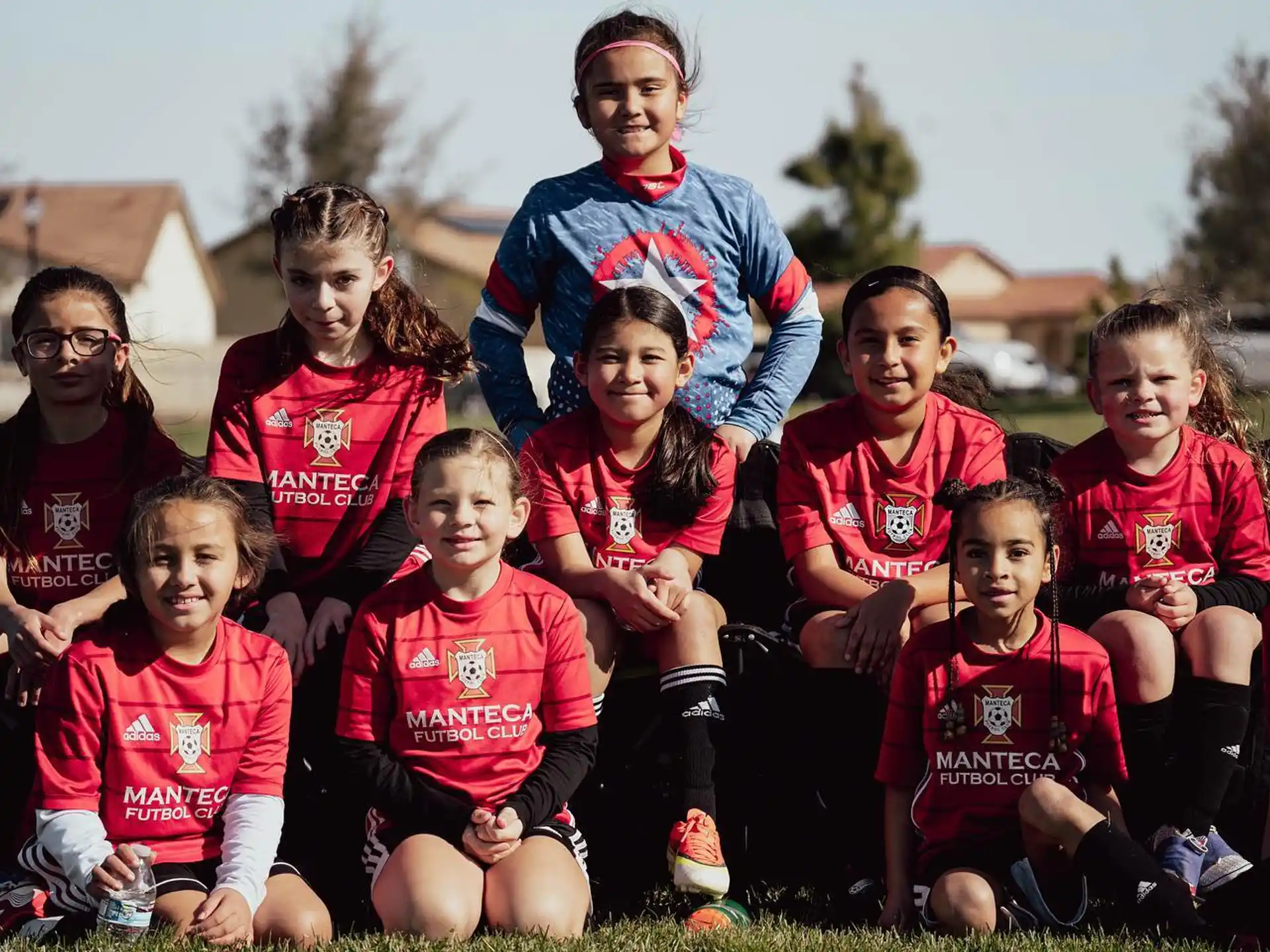a group of children posing for a photo
