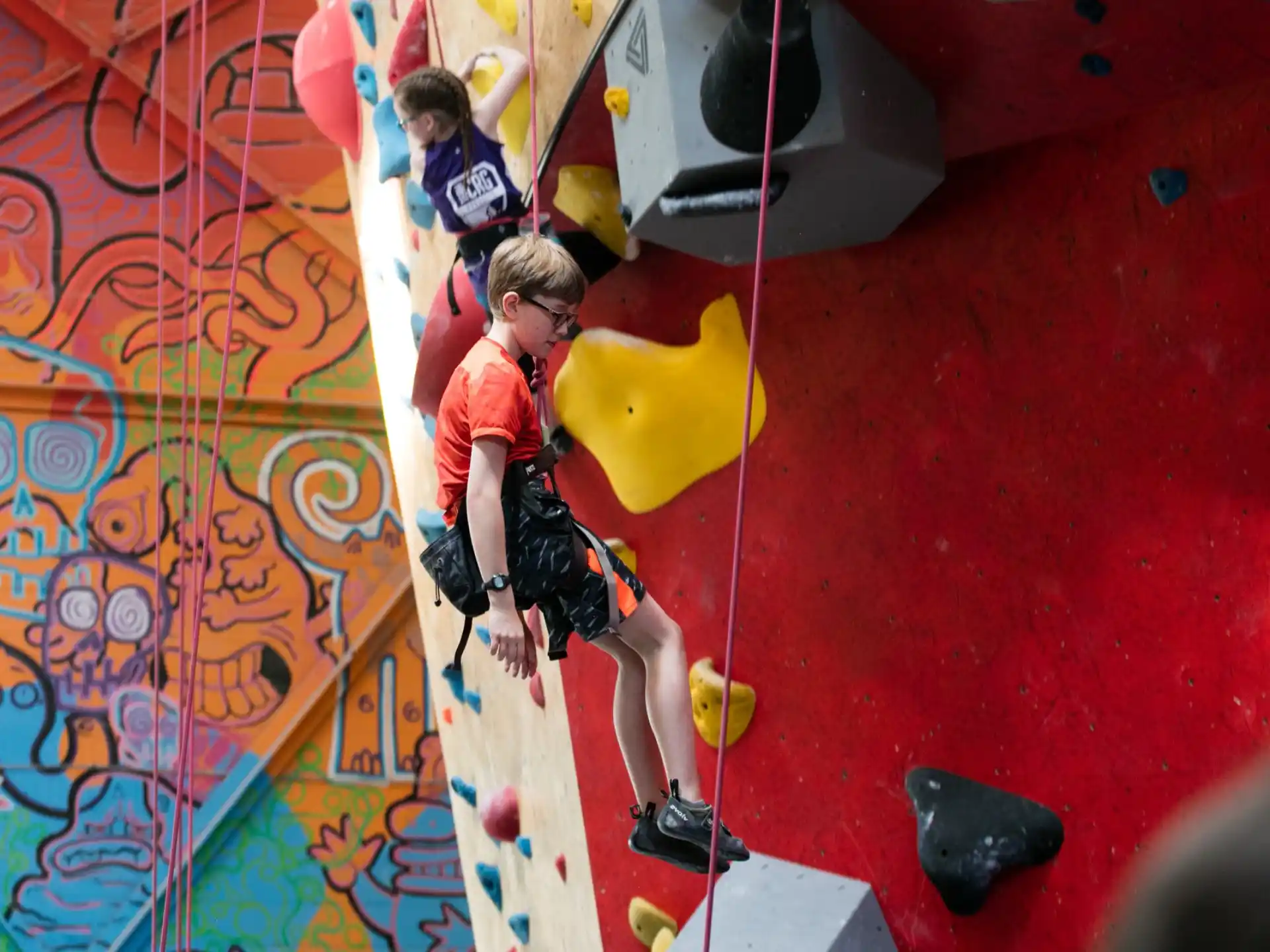 a person climbing a rock wall