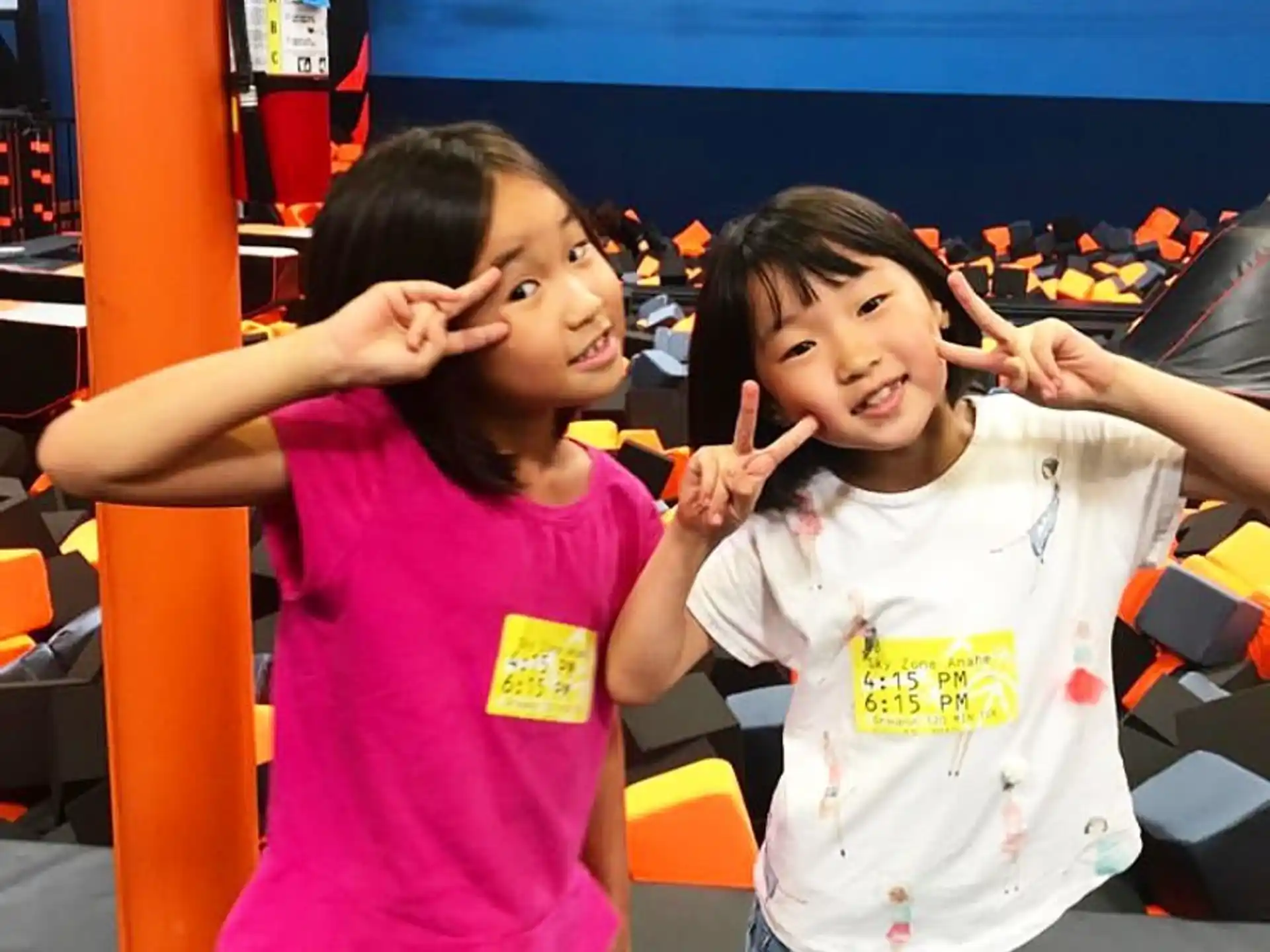 a group of children posing for the camera