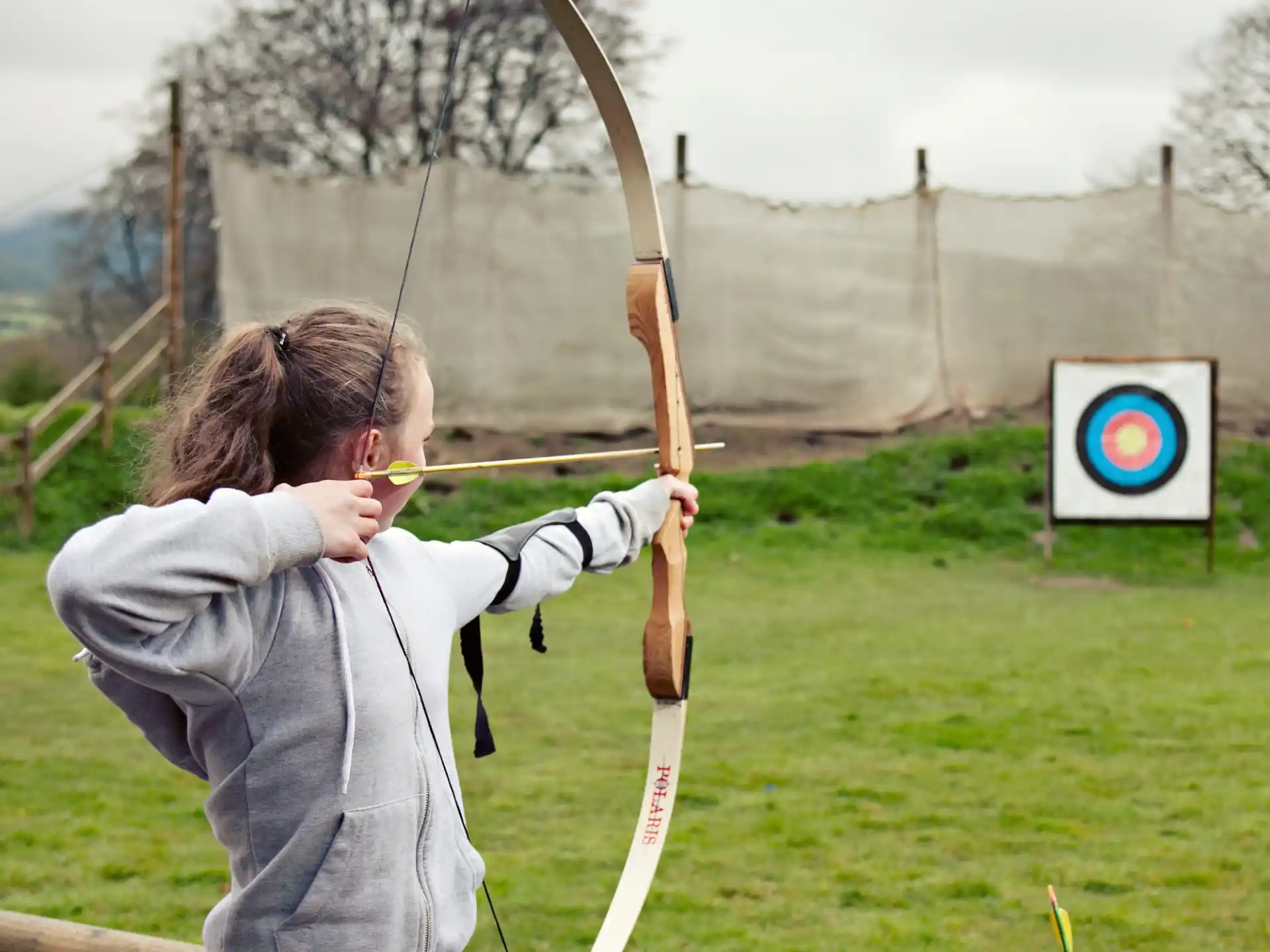 a person shooting a bow