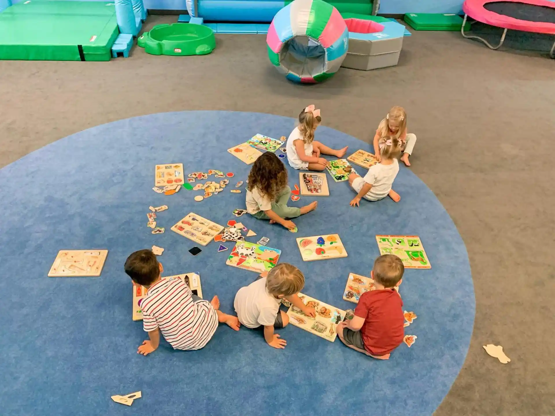 a group of children playing on the floor