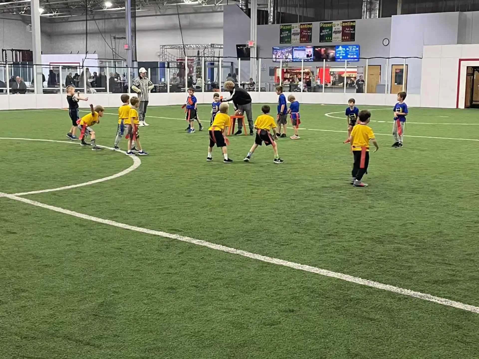 a group of people playing football